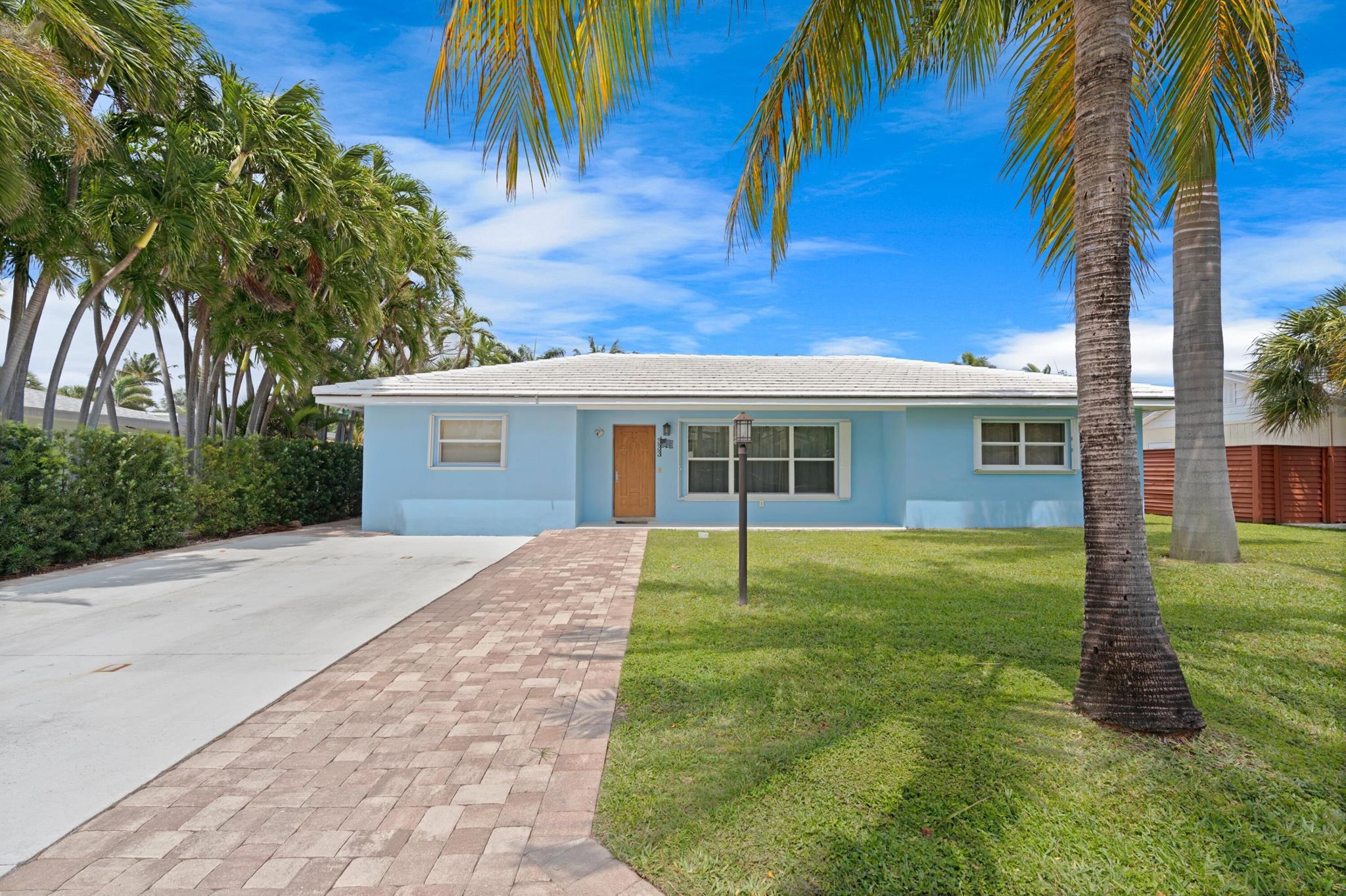 This 2BR 2BA (with converted garage for potential work space or bedroom)  has had recent renovations to the entire inside and back yard / pool area. The inviting pool is screened in with a private, tree-lined fenced back yard. This home is ideally located - two blocks from the Palm Beach Inlet and walking distance to Sailfish Marina - in the town of Palm Beach Shores. Palm Beach Shores is a small town located on the southern tip of Singer Island. Surrounded by ocean, inlet and the Intracoastal, this little enclave of homes is a gem of a neighborhood with its own police and fire departments, community activities, beach access and more. Photos coming soon.