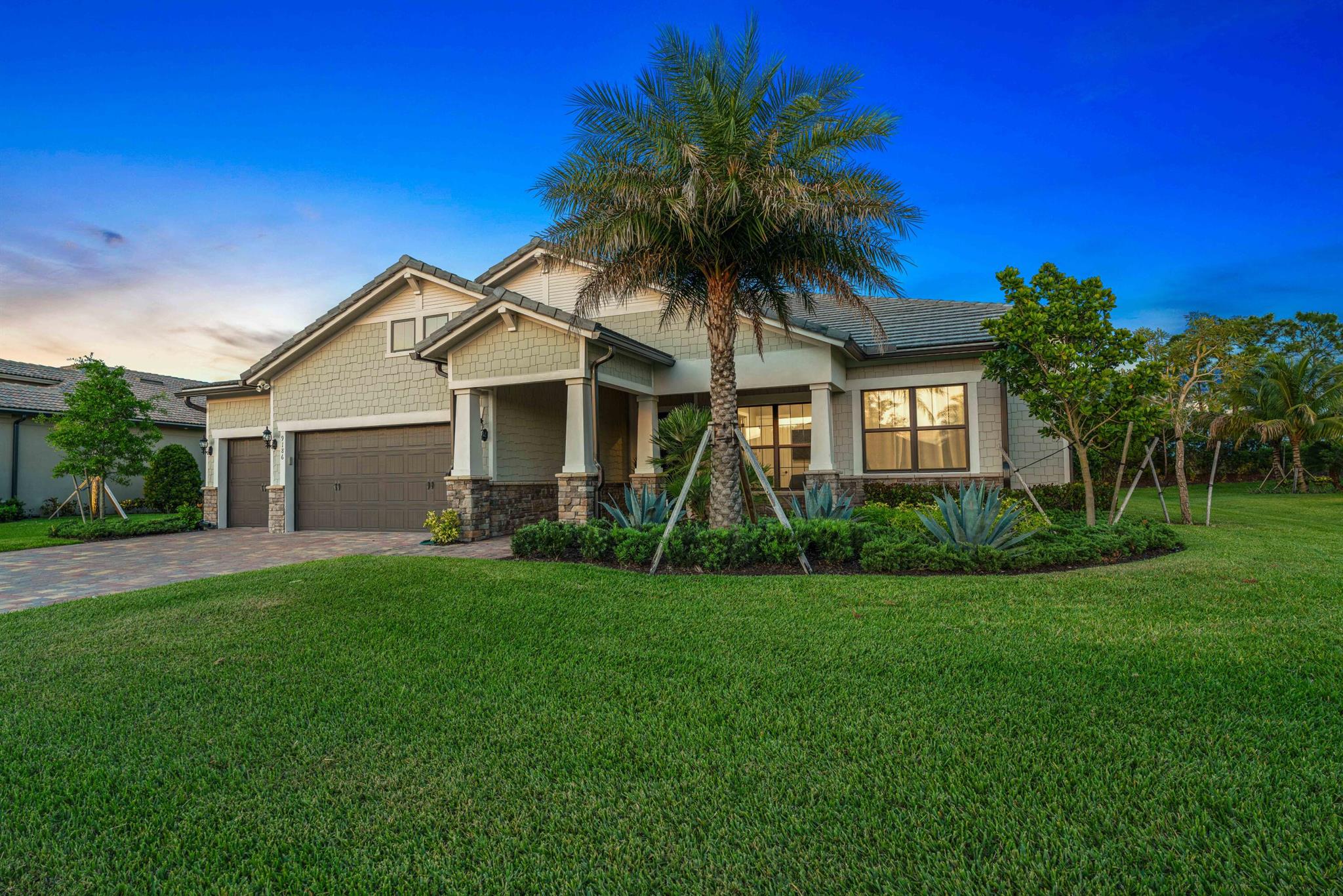 This impressive new construction home in  Ancient Tree shows like a model!  Upgrades galore.  4 bedrooms  with open Florida living style. 5th rm has murphy bed system.  Coffered ceilings.  Living and dining rooms feature 'no corner doors' leading out to the spacious screened lanai.  Perfect for entertaining!  Chef's kitchen features Aristokraft cabinetry, spacious pantry with custom built ins, gas cooktop, huge island with kitchen seating, and  high end SS appliances.  Expansive primary bedroom features two elaborate walk-in  closets.  Split bedroom floorplan allowing privacy for all.   This home is not to be missed!  Two Tesla charging stataions in the garage. Sandhill Crane golf course is adjacent to the home for golf and dining...a great benefit without joining a Club membership!