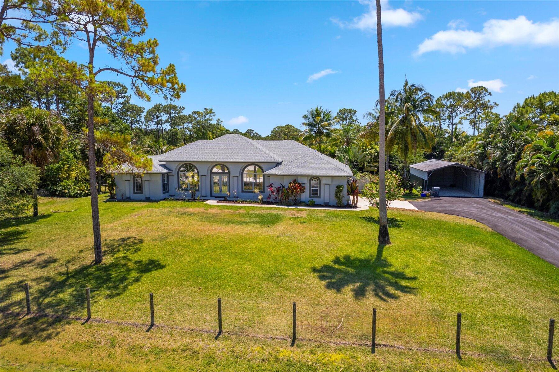 Lovely home on 1.15 acres, 3 beds 3 full baths.  Stainless Steel appliances, RO water system.  Pond and Pool, Fruit trees, 2 Wells, Sprinkler System, Roof was done in 2018, AC in 2022, Water Heater in 2022.  Boat Port could easily be turned into a shop. Paved driveway.