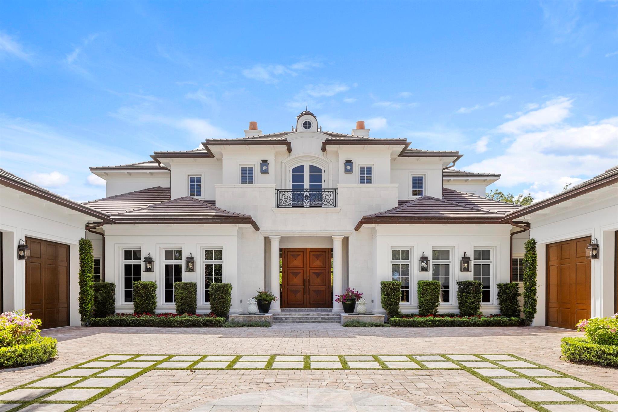 Welcome to 131 W Bears Club Drive, located on nearly 0.6 acres in Jupiter's prestigious golf community. This stunning estate, designed by Randall Stofft and built by Onshore Construction in 2018, boasts over 12,000 total square feet, 7 bedrooms, 8 full bathrooms, and two half bathrooms. Step outside to enjoy the lush landscaping that creates a tranquil outdoor space perfect for entertaining, complete with ample seating, a summer kitchen, large pool, spa, pergola, and a fireplace. The Bear's Club stands as the most expansive golf community in the area, spanning 400 acres with just 100 residences. Renowned for its world-class golf facilities, the club counts multiple PGA and LPGA tour players among its members. Known for its commitment to excellence, The Bear's Club offers the highest
