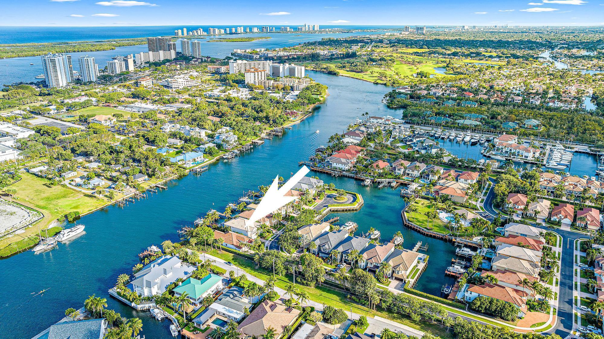 Presenting a waterfront oasis nestled in the prestigious community of Prosperity Harbor, boasting direct frontage along the picturesque Intracoastal Waterway. This meticulously maintained residence offers a multitude of forward thinking modifications and recent enhancements that will impress the most discerning client. Showcasing a stunning facade with a fresh color change in February, new impact garage door and meticulously resealed pavers ensuring both curb appeal and durability. Offering a rejuvenating salt chlorinated pool with a new pump and system installed in 2023, complemented with Jandy controls and LeafFilter gutter protection. Premium finishes featuring solid core wood doors, granite countertops, crown molding throughout and Saturnia marble on the first level. Hunter Douglas...