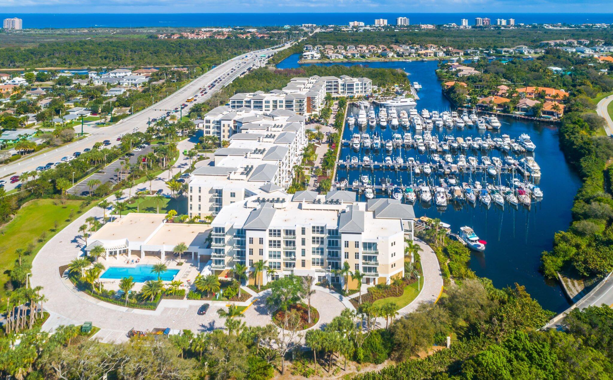 Nestled beside a serene private marina, this luxurious three bedroom condo offers panoramic views of sparkling waters, Built in 2018, its modern design seamlessly blends elegance with functionality.  With three bedrooms and 3 and 1 half baths, each bedroom boast comfort and style. Residents enjoy exclusive access to amenities include 2 community pools, state of the art fitness center, golf simulator and your own private wine locker.  The card room and billiard room provide spaces for leisure and entertainment, making every day feel like a retreat in this waterfront paradise. Get ready to enjoy the delightful views from your balcony overlooking the marina from this top floor penthouse. You will truly be impressed.
