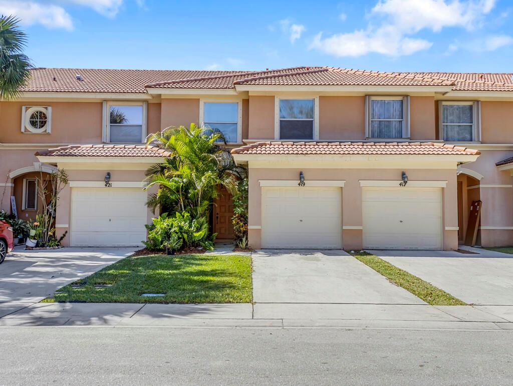 Come see this beautiful townhome located in the heart of Royal Palm Beach. This townhome is located near shopping with Costo, Calypaso Bay Water park, sport fields that include baseball and football fields and many restaurants!  This 3 bedroom 2.5 baths floorplan comes with a single car garage. 2nd level floors have been updated with wood laminate. This home is perfect for a 1st time home buyer & no wait to lease for investors. Other features include Large walk-in pantry and extra shelving in the garage.