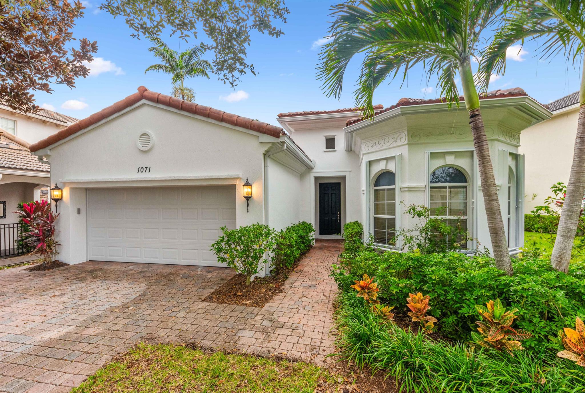 This renovated single-story home in Evergrene, Palm Beach Gardens offers comfortable living with its spacious layout. It features 2 bedrooms, 1 den that could be converted to another bedroom and 2 bathrooms, providing ample space for your needs. The home boasts a large private backyard with a lush landscape setting and a covered lanai, perfect for enjoying the outdoors. Don't miss the opportunity to make this your dream home in a desirable location. The open floor plan with volume ceilings creates a great sense of space. The kitchen has been beautifully transformed with newer stainless steel double oven, warming oven, and gas cooktop. The addition of beautiful new quartz countertops, a designer backsplash, and a new sink and faucet adds a touch of elegance to the space.  See Supplement The professional sprayed white and gray wood cabinets with soft close further enhance the kitchen's style. The exterior of the home has been freshly painted, giving it a fresh and inviting look. Inside, you'll find beautiful wood flooring and tile throughout, with no carpeting. The California closets provide ample storage space. The AC and hot water heater of this home were replaced within the last 2-3 years.  The Master Bath and secondary baths have been remodeled and are gorgious.

The home also offers plenty of natural light, functionality, and style. These are just a few of the many features that make this home truly exceptional.

Evergrene is renowned for its resort-style amenities, offering a pool, fitness center, weight room, Tiki Bar, splash park, and various recreational activities such as fishing at Lake Dorothy pier and pickleball. The community is also located in close proximity to beautiful Juno Beach, fine dining, entertainment options, and premier shopping destinations, enhancing the appeal of this exceptional property.

No detail has been spared in the meticulous updates throughout the home, making it move-in ready for its new owner. Schedule a private showing today and seize the opportunity to experience a lifestyle of comfort and convenience in this meticulously crafted residence.