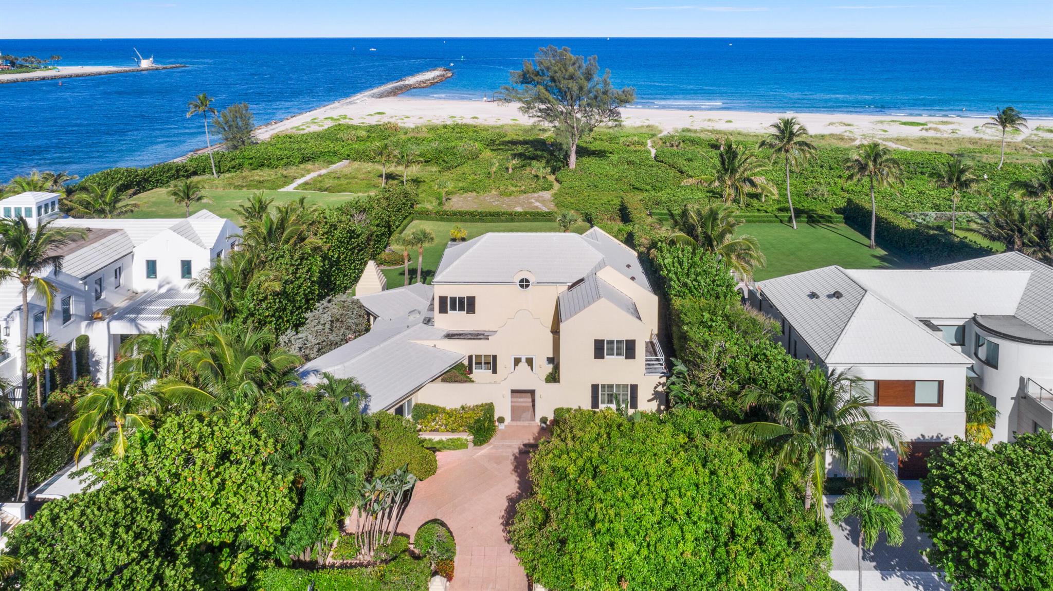 Direct Oceanfront home with private beach and sweeping ocean views from the main primary rooms. A rare opportunity to enjoy a tranquil setting. The house has 6 bedrooms, 7 baths and 1 half bath.
