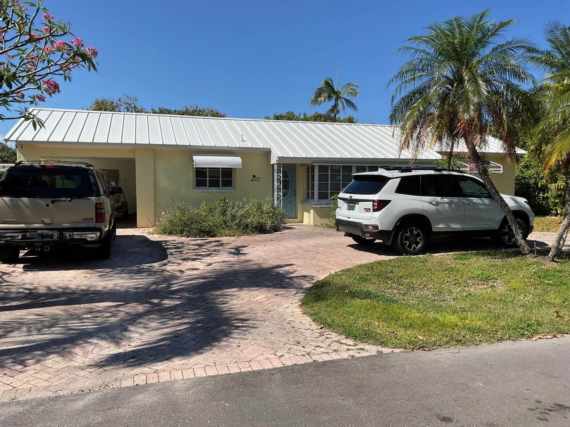 Great find in Palm Beach Shores!  3 bedrooms, 2 baths in one of the best locations in Palm Beach County.  Lots of tropical foliage and fruit trees. Walking distance to the beach, Sailfish Marina, Water Taxi, Palm Beach Inlet, restaurants and shopping.