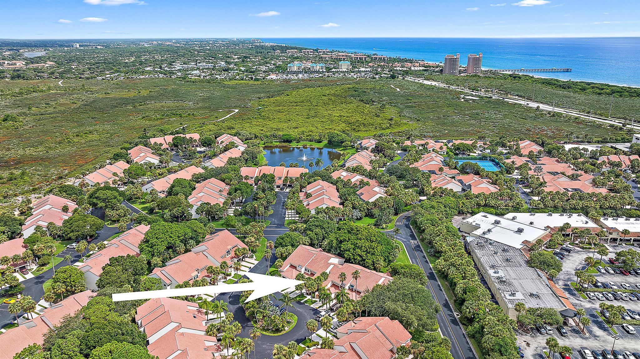 JUST PAINTED OFF WHITE, this LOVELY 2/2 condo w/ 1 car garage located in a highly coveted community of Sea Oats in Juno Beach! Minutes to the Juno Beach Pier, beaches & dog friendly Jupiter Beach. Enjoy vaulted ceilings in the main living areas & bright open floor plan w/ eat-in kitchen which opens to the great room & overlooks the private screened porch. Newly renovated guest bathroom (18k), master suite has large closet, Roman tub, walk-in shower & dual vanities. ALL NEW Pex pipes were replaced throughout (10k) & converted atrium in kitchen to insulated impact window (23k). Impact glass throughout except 2 sliders. Community offers heated pool, tennis/pickle ball courts & clubhouse. 2022 AC/water heater is 2021. All appliances 1 yr old. SELLERS MOTIVATED!