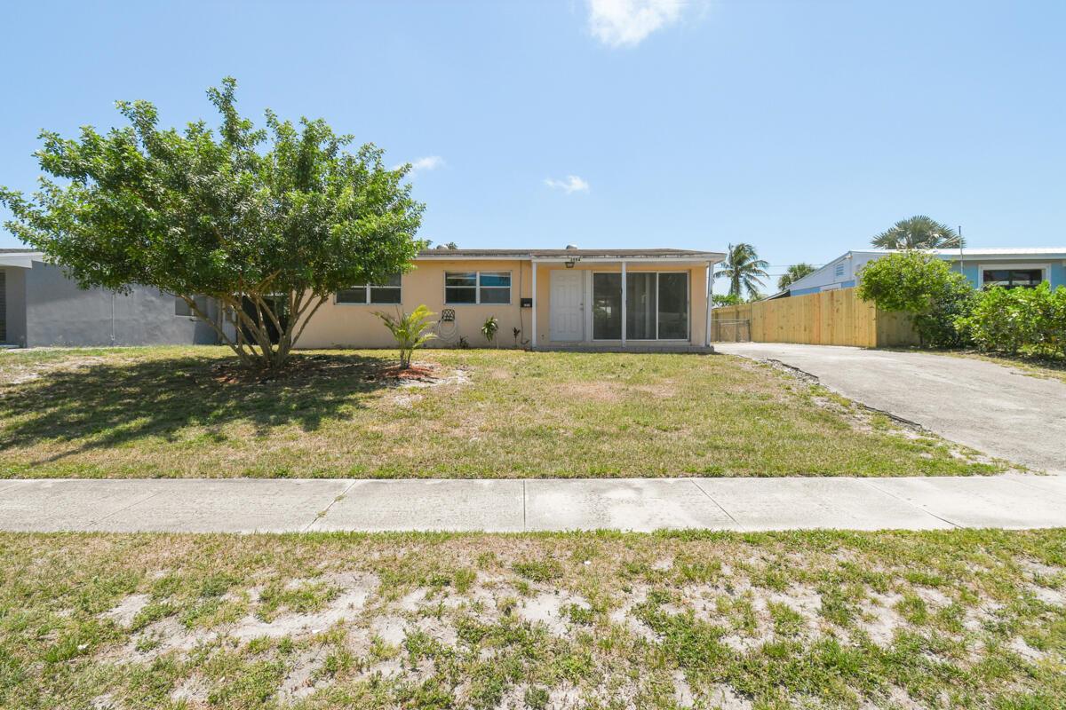 2014 ROOF 2014 WATER HEATER 2011 HVAC A cozy three-bedroom home tucked away in the lively heart of Palm Beach Gardens, Florida. Situated within a leisurely stroll to Downtown at the Gardens and the Gardens Mall, with convenient access to the 95 corridor. Revel in the delightful amenities of Palm Beach Gardens while calling this centrally located residence your own. Featuring tile floors and laminate flooring, updated cabinets, and a generous fenced backyard, it offers a cozy and welcoming atmosphere. With one bathroom, well-proportioned bedrooms, and ample windows bathing the space in natural light, it ensures a comfortable and airy living experience. Buyer to verify exposure all measurements approximate  Professional Photos Thursday No Blind Offers