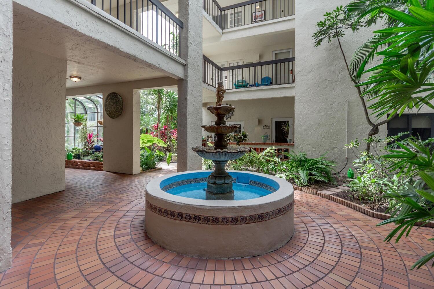 Come check out this ''Hidden Gem'' in Ocean Trail. Building 5 sits between the water to the west, and its own lake and Carlin Park to the south. Wide open interior walk-ways are open to a central fountain and verdant atrium reminiscent of classic  resort style hotel. This fully renovated corner unit has a bright proper foyer that leads to the open living concept - living room, kitchen and dining area. Both bedroom have large walk-in closets with tons  more storage throughout. Ocean views can be seen from main living area and master bedroom. Primary exposure is south-east with sun all day. There is a 5' x 4' storage unit included and Rock Star parking.