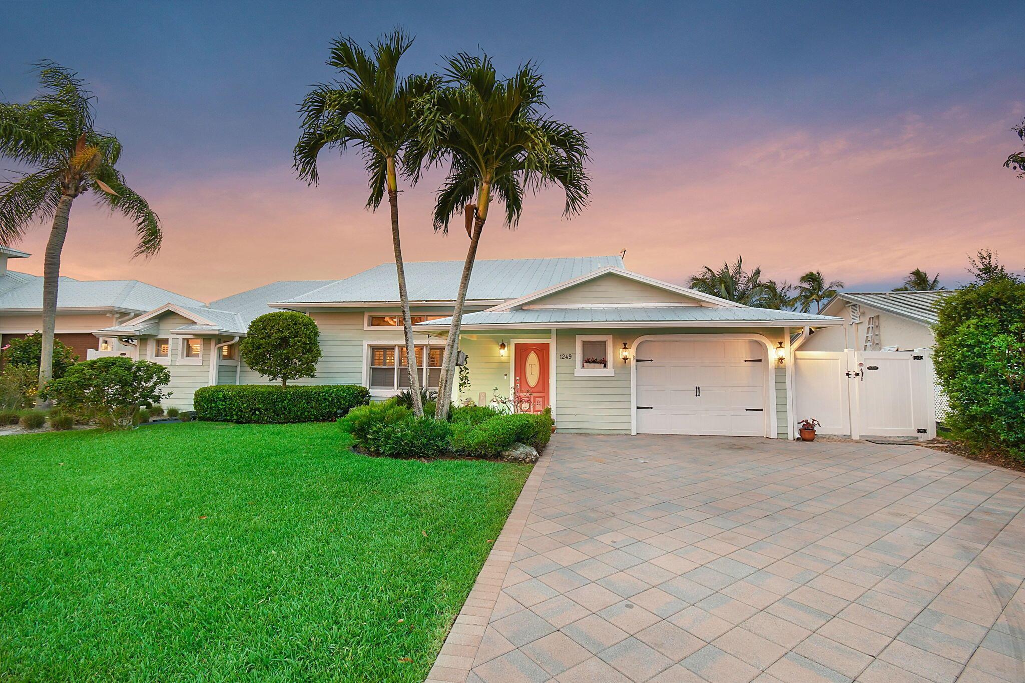 A boater's paradise in highly desirable Lighthouse Point in much sought-after Palm City. This stunning waterfront coastal-style home with 4 Bedrooms + Office is waiting for you! Beautiful Master Bath recently remodeled. Open floor allows plenty of room for family and friends. Now it's Tiki Time