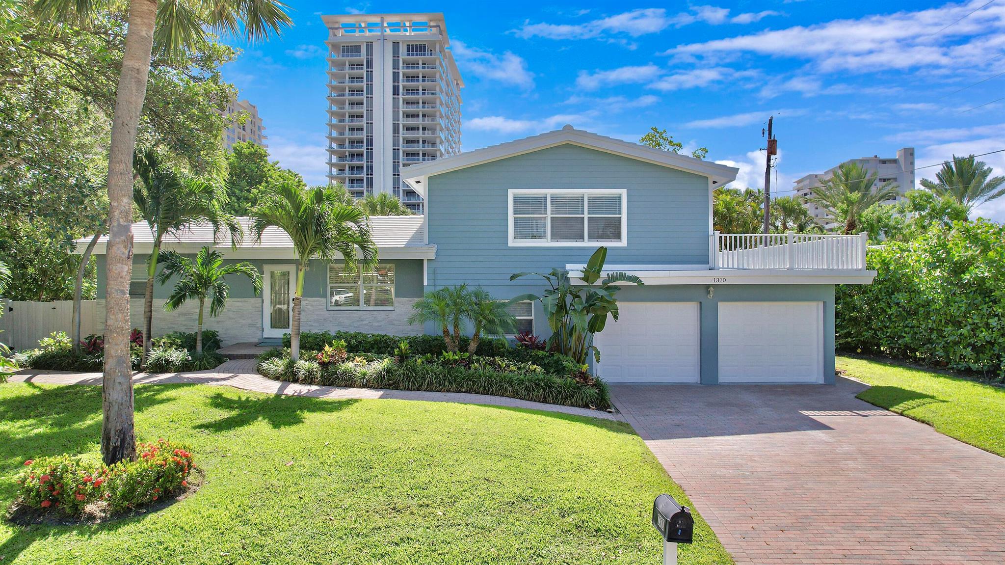 Gorgeous beach home located in the Yacht Harbor Manor of Singer Island, directly across from the ocean. Closest single-family home on the island to the beach. Easy walk to dining and Sailfish Marina. This bright, split-level home with 2,147 square feet of open concept living space is perfect for families or entertaining. Fully renovated and furnished, this home is move-in ready, just bring your bags. Vaulted ceilings and French doors in the living room showcase the stunning outdoor space this property has to offer. Enjoy ocean breezes in the spacious, fenced backyard with a pool, new outdoor shower, covered patio area, balcony, and plenty of green space, new flat roof/balcony, new ductwork, impact windows, tropical landscaping, and deeded private beach access. Currently rented at $6,500