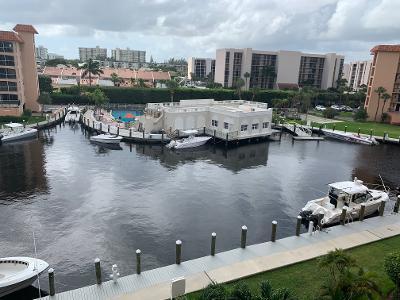 Water. Water, Water Views!Completely redone-light & bright w/ gorgeous marina view from screened in balcony in man gated community on intracoastal w/ tile, impact windows. Open kitchen w/ granite countertops, stainless steel appliances, dual bathroom sinks, spacious master bedroom. San Remo has community heated pool/clubhouse w/ kitchen & bbq & gym right across private beach. Newer marina seawall. Exterior buildings painted & more. Basic cable, internet, & water included! Trucks & Motorcycles welcome. ALL ages! NO Pets! San Remo is centrally located near airports, shopping malls, restaurants, Mizner Park, beaches, houses of worship. Property is sold ''AS IS'' w/ Right to Inspect. Please use current FAR/BAT contract.