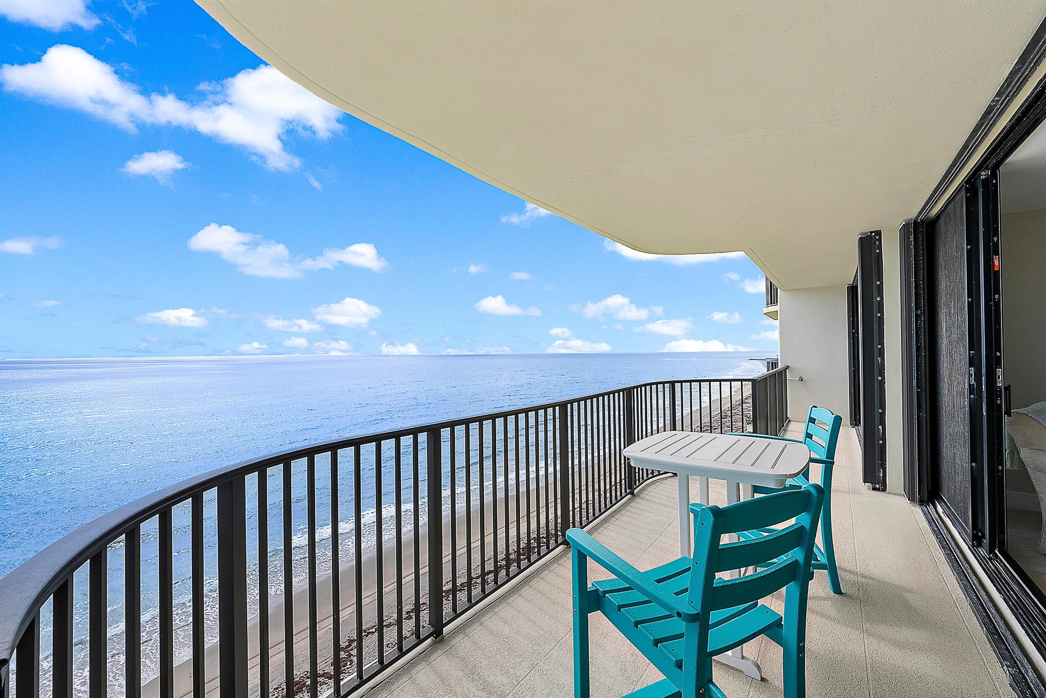 DIRECT OCEANFRONT & GORGEOUS INTRACOASTAL VIEWS-Wake up to the unparalleled & unobstructed turquoise blue ocean in this furnished light, bright and immaculate condo w/an open floor plan or watch the yachts go by on the Intracoastal! Gorgeous condo that is steps from the ocean. This meticulously maintained slice of Heaven has new porcelain flooring, neutral granite countertops, shaker cabinets and plantation shutters. Building has been renovated with a new(er) roof 2022, renovated lobby, edge pool and clubhouse which has an elevator to 2nd story fitness facility overlooking the ocean, building GENERATOR, sprinkler sys. Also has private beach access, very large storage lockers, a private car wash for residents only and
