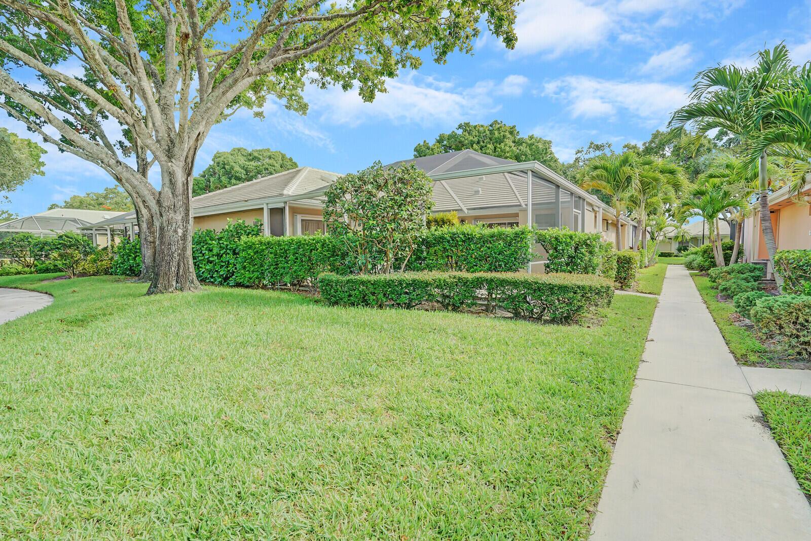 You found you piece of Paradise. This one-story Villa 2/2 comes with a huge patio. Great  for outdoor entertaining.  The screened in patio brings over 600more sq ft to the home.  This Charming villa in the desirable Lake Catherine community which is in a great location (east of I95) close to shopping, dining and only  20 mins to the beach. When you walk thru the front door you will be impressed with the high ceiling and the large open floor plan.  This home features split bedrooms.  Both bedrooms are on-suites.   Bring your fur babies as its a pet friendly community. Don't miss out!  This one will go quick.