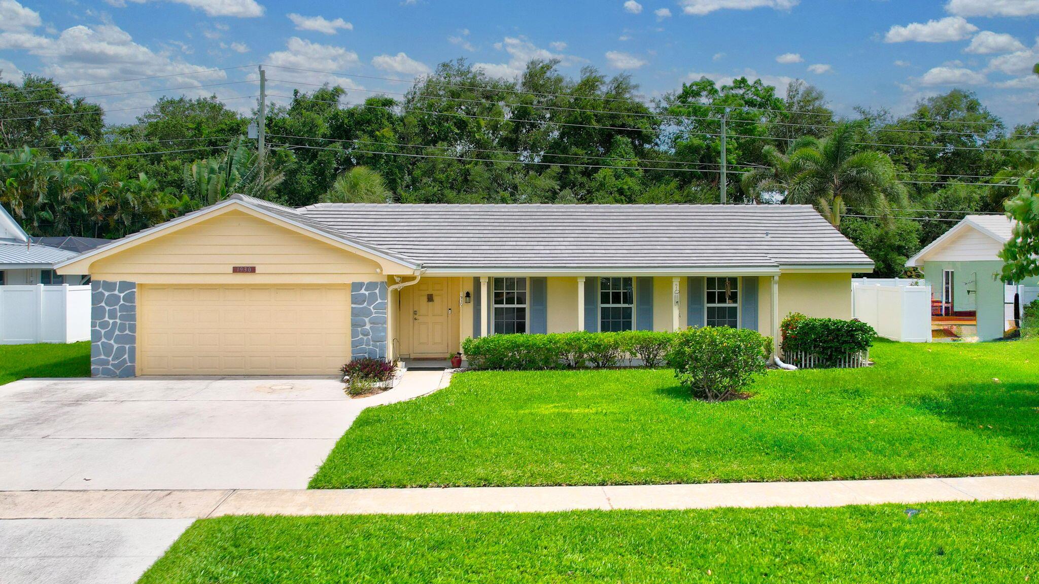 Fantastic one-story 3 bedroom 2 bath 2 car garage home in Juno Isles!  NEW ROOF MAY 2024, NEW AC JULY 2023, ALL HURRICANE IMPACT WINDOWS 2016, HURRICANE IMPACT FRENCH DOORS 2021, NEW PVC FENCE 2023.  NEW EXTERIOR PAINT 2024. Great lot that backs up to FPL parking area with green space buffer (no neighbors behind you).  Large back yard with room for a pool.    Zoned for North Palm Beach Conservatory School. 1.8 mile walk to the beach, or a short bike ride.  1 mile to Bert Winters Park or .6 mile to Juno Park boat ramps and baseball fields.  Close to I95, turnpike, 20 minutes to Palm Beach Airport.  Walk to work at FPL!  Come see it today!