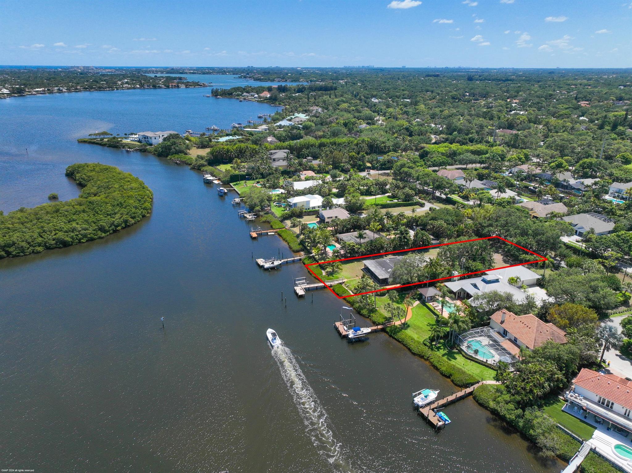 Exceptional opportunity to build a custom home on just under .7 of an acre with 100 ft on the Loxahatchee River. Beautiful water views with a dock on a quiet , peaceful street with only 7 riverfront homes. No HOA, low unincorporated only taxes, and the ability to build any style of house that you prefer. Live in the highly desirable town of Jupiter and build your waterfront  dream home. Just a short boat ride to the Jupiter Inlet & sand bars and quick  access to I-95 and the turnpike.