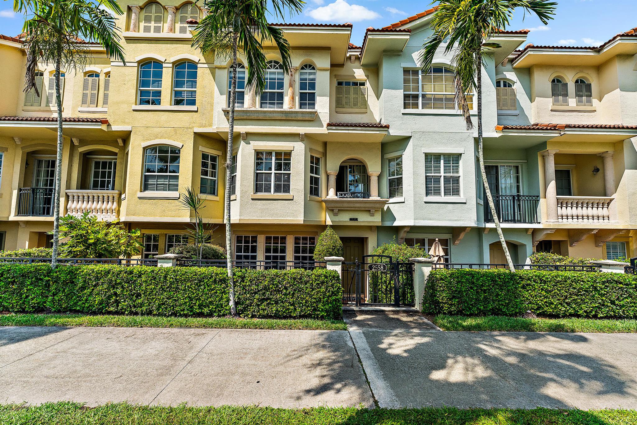 Discover this inviting 3-story townhouse in Palm Beach Gardens, a short stroll from bustling shops and serene beaches. Boasting 2 bedrooms and 3.5 baths, it features dual master suites, a flexible ground-floor space, and a 2-car garage. Recently painted, it offers a clean, ready-to-occupy vibe with whole-house water filtration and a central vacuum for your comfort. Community perks include a pool, gym, and party room, plus direct access to Frenchman's Forest Natural Area and extra parking. It's conveniently a 10-minute walk from Gardens Mall and a quick drive to Juno Beach--a perfect canvas for new memories.