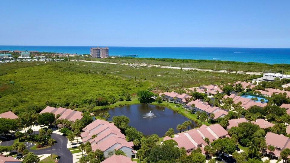 Spectacular unit with overlooking gorgeous lake views along with natural dunes. Escape to Paradise with minutes from the pristine beach and shops and restaurants all within walking distance. Unit is easily the most sought after in the whole of sea oats does need some work on the inside but worth it with the views. The community offers out of the world Clubhouse along with state of the art pool and tennis facilities. Best location in all of Jupiter/Juno beach