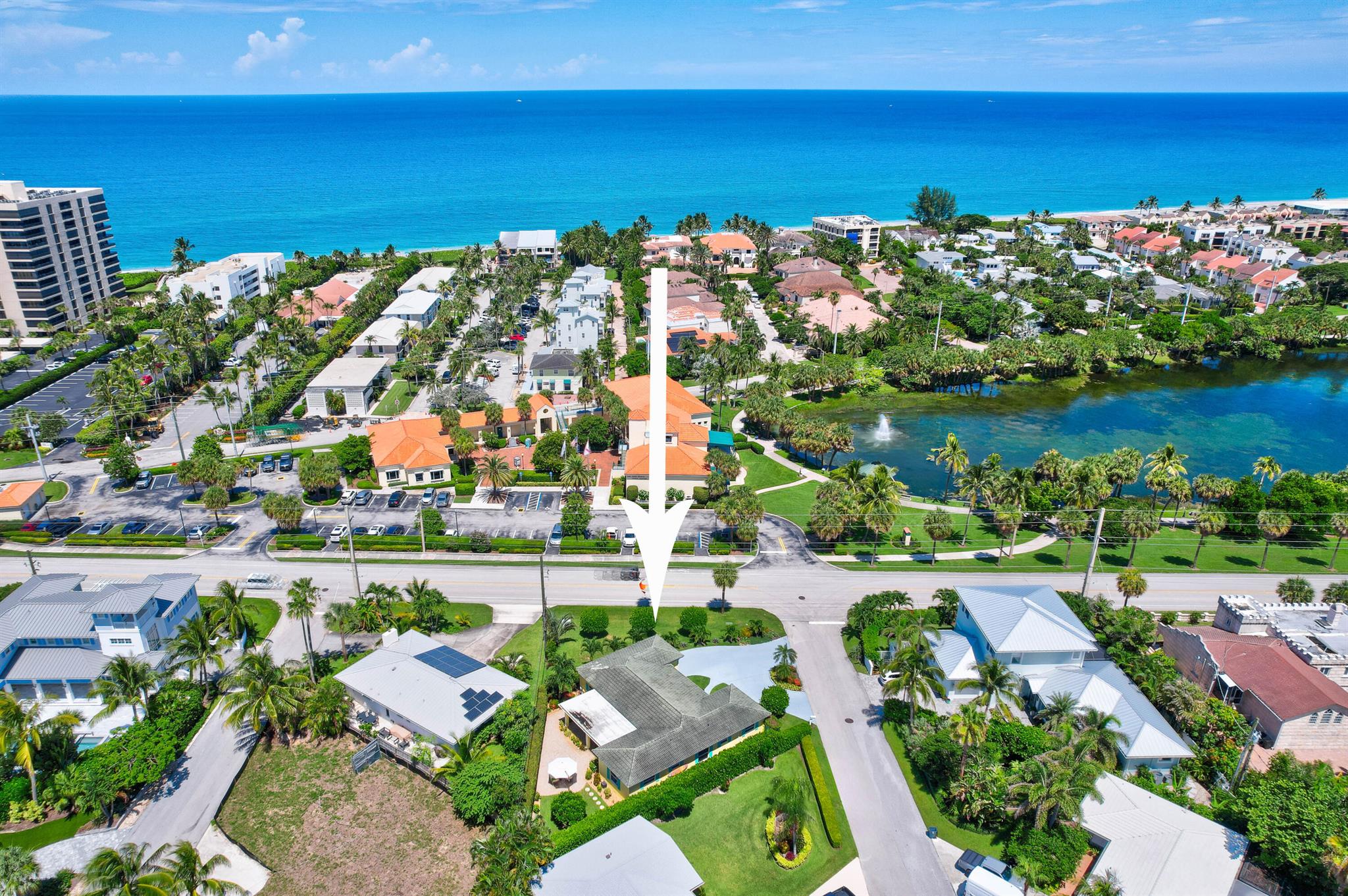 Welcome to your dream beach house in the picturesque town of Juno Beach. This charming 3 bedroom, 2 bathroom home is the perfect blend of coast living and investment potential. Whether you're looking for a serene beach retreat or a lucrative short term, turnkey rental, this home has it all. One of the few residences overlooking the serene Pelican Lake, this property boasts breathtaking views and tranquility. Just a block from the pristine sands, you'll enjoy the ultimate beach lifestyle. Step inside to discover beautiful hardwood floors throughout, highlighting the meticulous renovations. The spacious and bright living areas feature impact windows, ensuring safety and energy efficiency. The oversized patio is perfect for entertaining or simply relaxing, with plenty of room to add a pool in your backyard oasis. Conveniently located near the Juno Beach Pier, fine shopping, exquisite dining options, and just a short drive to the airport, this beach house offers both seclusion and accessibility. Don't miss the opportunity to own a piece of paradise in Juno Beach!