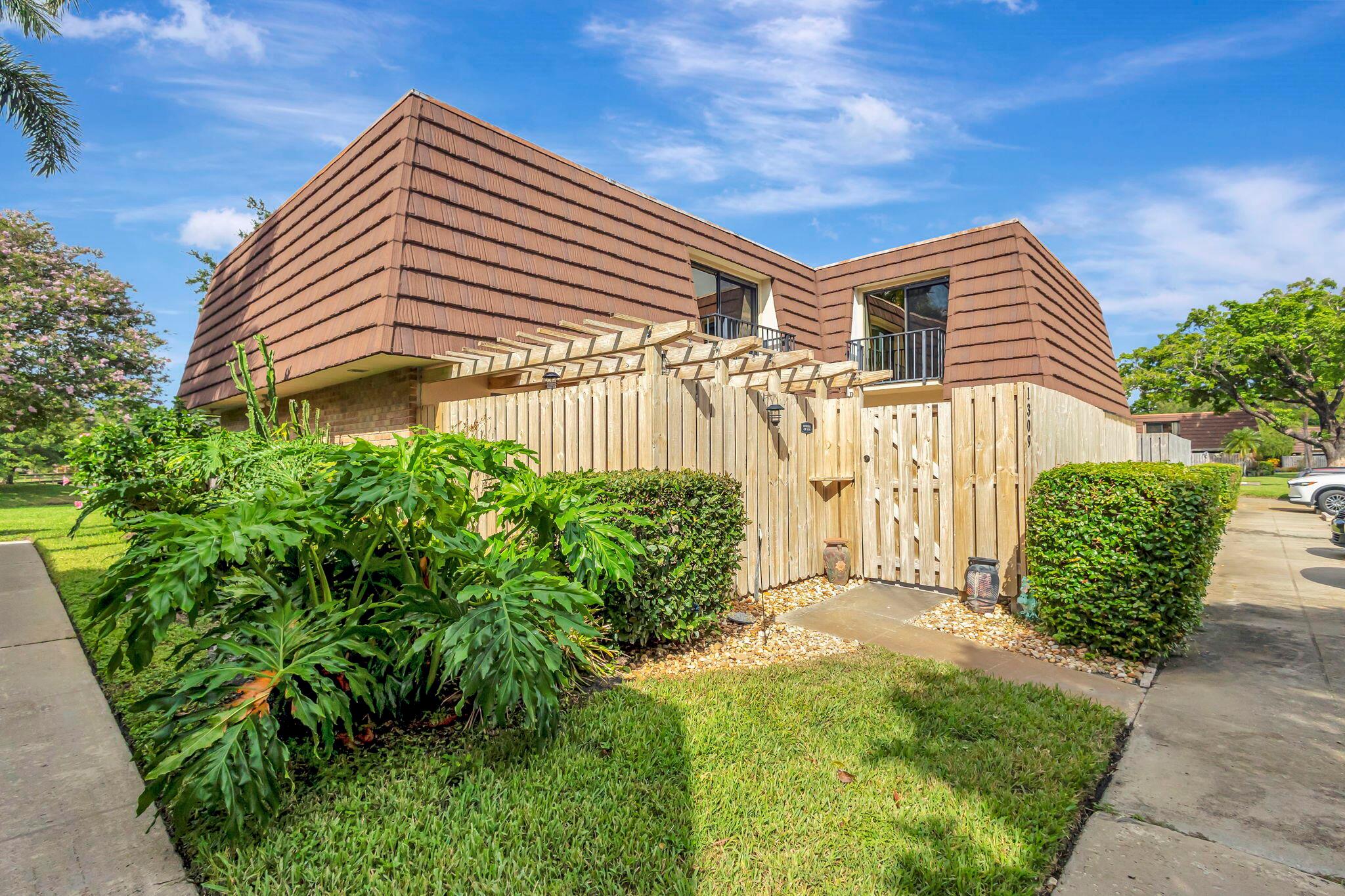 Come see this beautiful move-in ready townhome located in the highly sought-after Palm Beach Gardens, Florida. This Townhome features 2 bedrooms 2.5 bathrooms with a Den or 3rd bedroom on the first floor!  Recently remodeled within the last couple of years, this home boasts stainless steel appliances, granite countertops, gas stove, a touchless kitchen sink, newer kitchen cabinets, newer flooring throughout, a new water heater, new bathroom vanities, and fresh paint. Nestled in a peaceful and beautifully maintained community, this townhome offers close proximity to everything you need. Enjoy the prestige of PGA National, fine shopping at The Gardens Mall, the convenience of grocery shopping at Fresh Market or Publix, and the vibrant lifestyle restaurants, shopping options, and IMAX movie theater. Close to the beautiful Sunny Florida Beaches and easy access to I-95 for easy commuting.  This property embodies the best of Palm Beach Gardens Florida living!