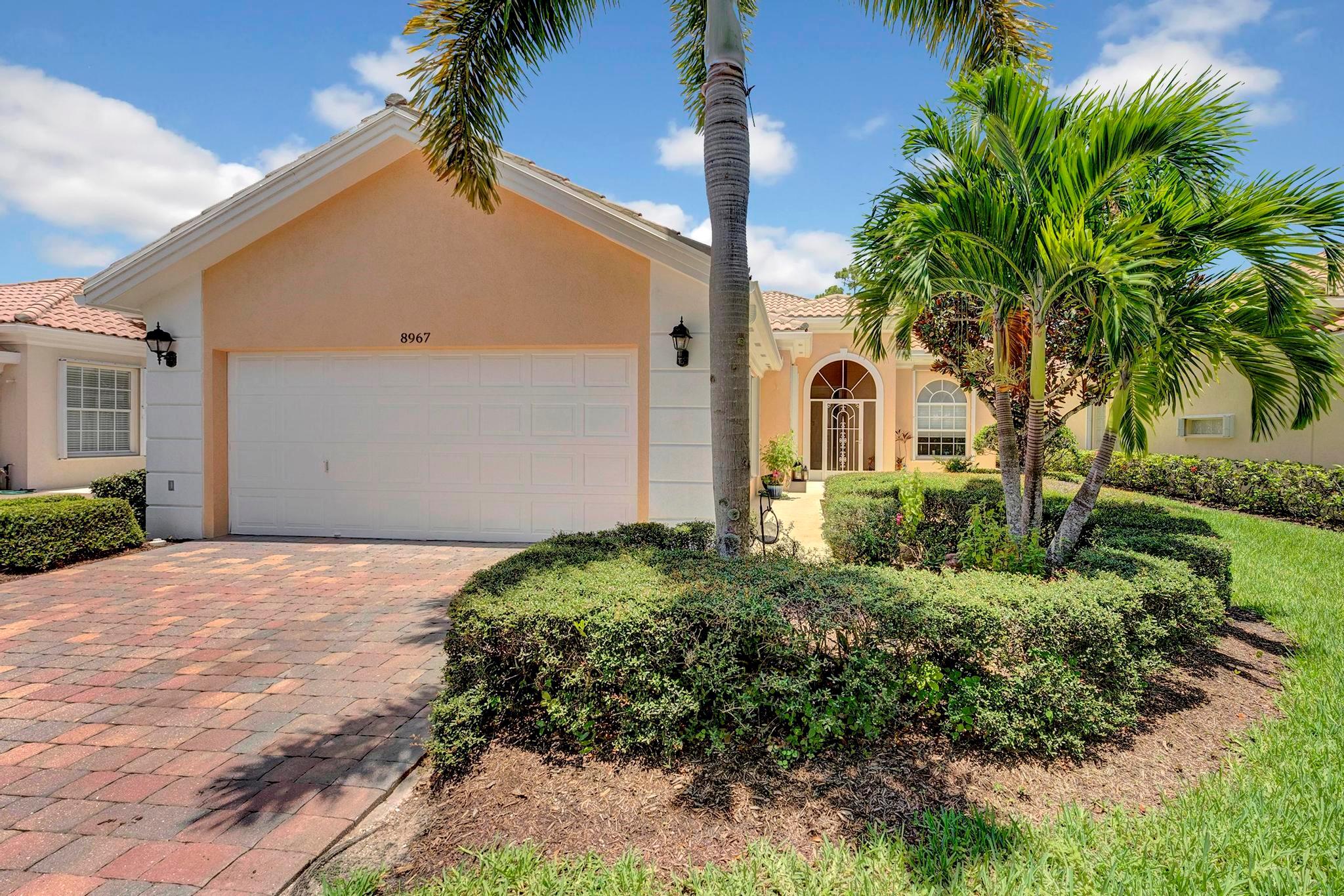 Unwind in ultra-privacy at this spacious ranch-style home in the highly desirable Carlton Oaks community of West Palm Beach. This 4-bedroom, 3-bathroom + 2-car garage retreat boasts a bright and airy feel, perfect for Florida living. The ideal split-floor plan offers privacy for families, with bedrooms on opposite sides. Whip up culinary delights in the open kitchen featuring gleaming stainless steel appliances. Unwind on the covered patio and or enjoy hosting your favorite people and gatherings and soak up your own slice of Florida sunshine. Enjoy peace of mind year round with hurricane accordion shutters. The family-friendly, all age's community of Carlton Oaks offers a gorgeous pool, clubhouse, tennis, and pickleball courts!  (see more)