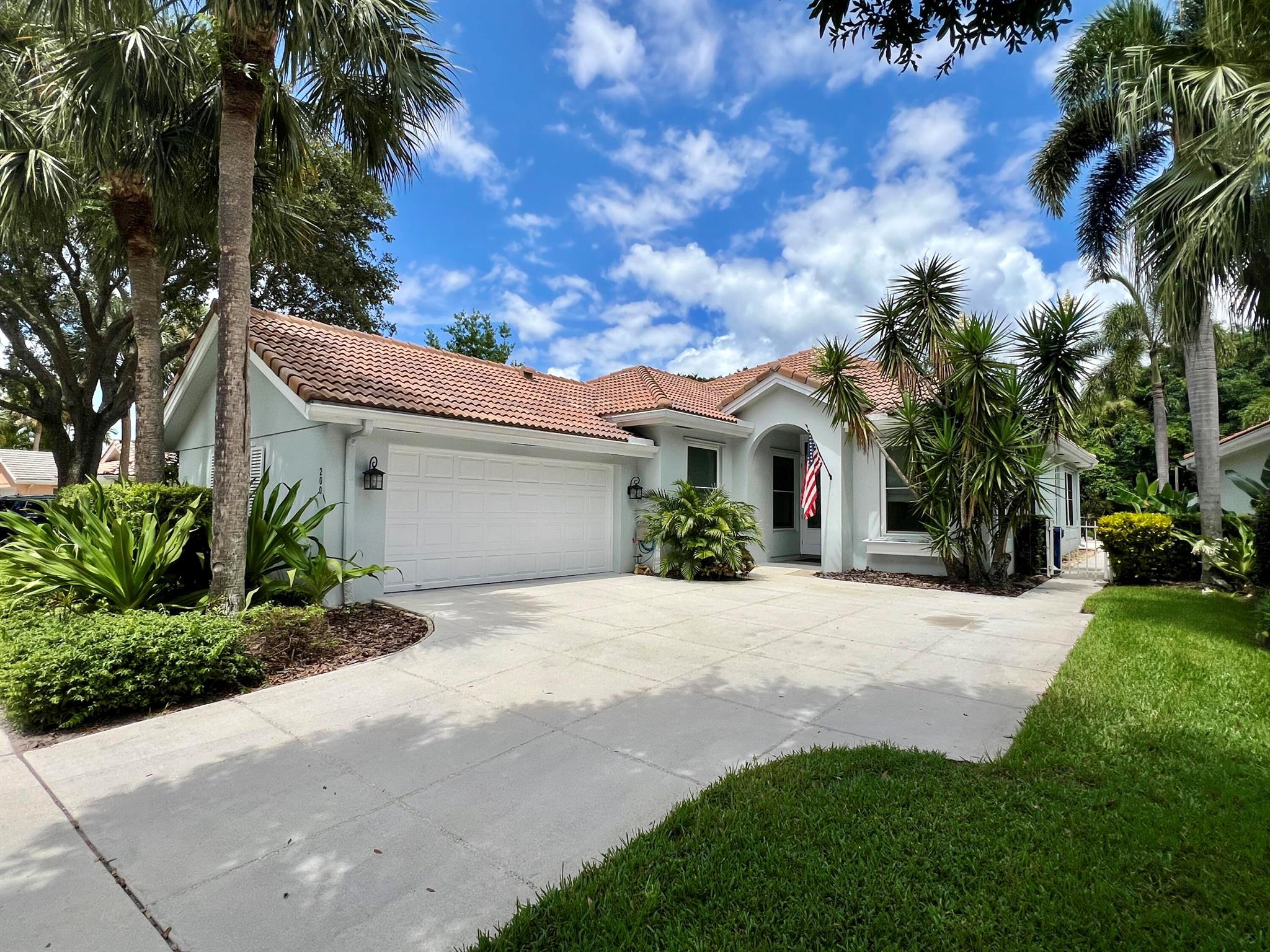 Gorgeous designer remodel in the heart of Jupiter! Only minutes to downtown Abacoa and a short drive to the beach. Upgrades include: Full impact windows, doors and sliders, ceramic tile flooring, remodeled kitchen with quartz countertops, remodeled baths, new plumbing, under cabinet lighting, updated baseboards and trim, and the list goes on. Very private yard and pool that backs to wooded green space. Quiet and peaceful setting. A real gem!