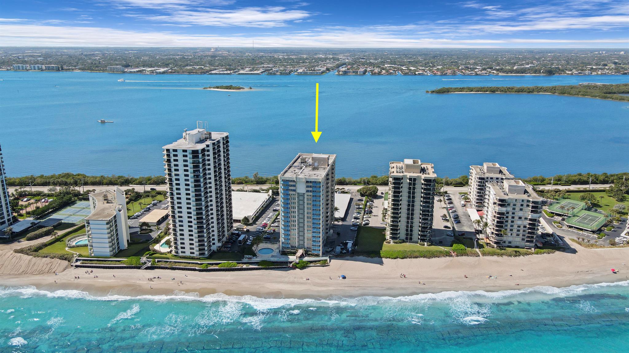 PET FRIENDLY - DIRECTLY ON OCEAN - WRAP AROUND BALCONY! This 2nd floor condo has some nice water views of the ocean and intracoastal. A unit in the same stack on the 11th floor is also for sale, so schedule to see both to see which you prefer. Interior has lots of potential to make it your own.  The kitchen can be totally opened up with a kitchen island overlooking the living room and water views. The condo unit is all impact glass sliding doors and windows. The Guest and Master bedrooms are both oversized with lots of closet space. There is a huge walk-in closet in the master bedroom. The condo has Washer/Dryer Hook-up & comes with covered parking! The unit also comes with an extra storage locker on the floor and bike storage. The Aquarius is located toward the preferred North end of... Singer Island, away from the hotels and timeshares, Aquarius has a beautiful private beach to enjoy year round. The Aquarius also has a new exercise room, sauna, billiard room, community room with kitchen, library, BBQ area with built-in gas grills and large picnic seating area overlooking the ocean. Imagine relaxing on the beautiful pool deck overlooking the beach the beach or lounging on the beach only a few steps away. Singer Island located is close to shops restaurants and the airport. Pet Friendly Building, dogs allowed up to 20lbs. Rentals permitted in 1st yr of ownership. Don't miss out on this fabulous unit located on Singer Island!