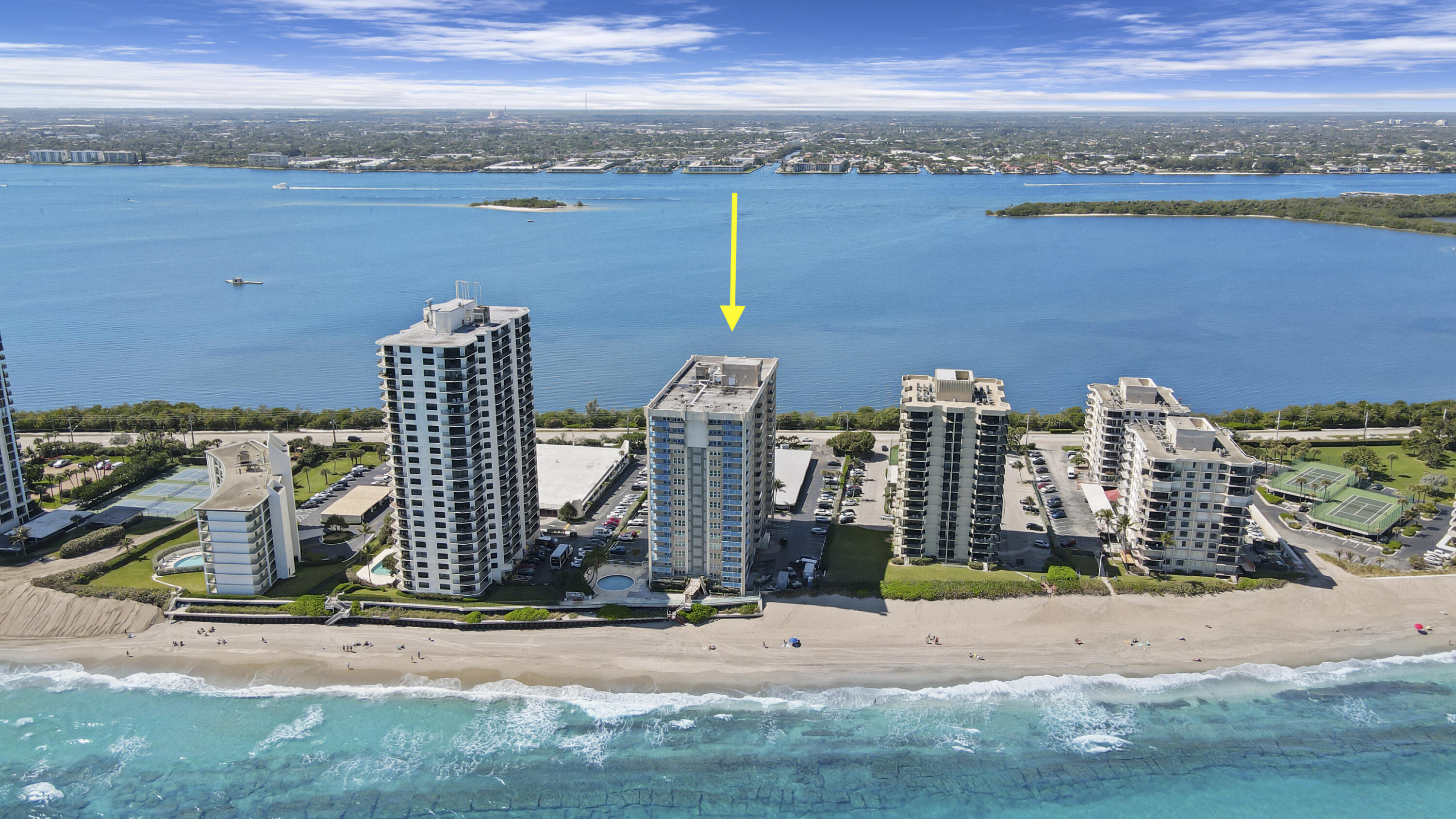 PET FRIENDLY - DIRECTLY ON OCEAN - WRAP AROUND BALCONY! This 2nd floor condo has some nice water views of the ocean and intracoastal. A unit in the same stack on the 11th floor is also for sale, so schedule to see both to see which you prefer. Interior has lots of potential to make it your own.  The kitchen can be totally opened up with a kitchen island overlooking the living room and water views. The condo unit is all impact glass sliding doors and windows. The Guest and Master bedrooms are both oversized with lots of closet space. There is a huge walk-in closet in the master bedroom. The condo has Washer/Dryer Hook-up & comes with covered parking! The unit also comes with an extra storage locker on the floor and bike storage. The Aquarius is located toward the preferred North end of... Singer Island, away from the hotels and timeshares, Aquarius has a beautiful private beach to enjoy year round. The Aquarius also has a new exercise room, sauna, billiard room, community room with kitchen, library, BBQ area with built-in gas grills and large picnic seating area overlooking the ocean. Imagine relaxing on the beautiful pool deck overlooking the beach the beach or lounging on the beach only a few steps away. Singer Island located is close to shops restaurants and the airport. Pet Friendly Building, dogs allowed up to 20lbs. Rentals permitted in 1st yr of ownership. Don't miss out on this fabulous unit located on Singer Island!