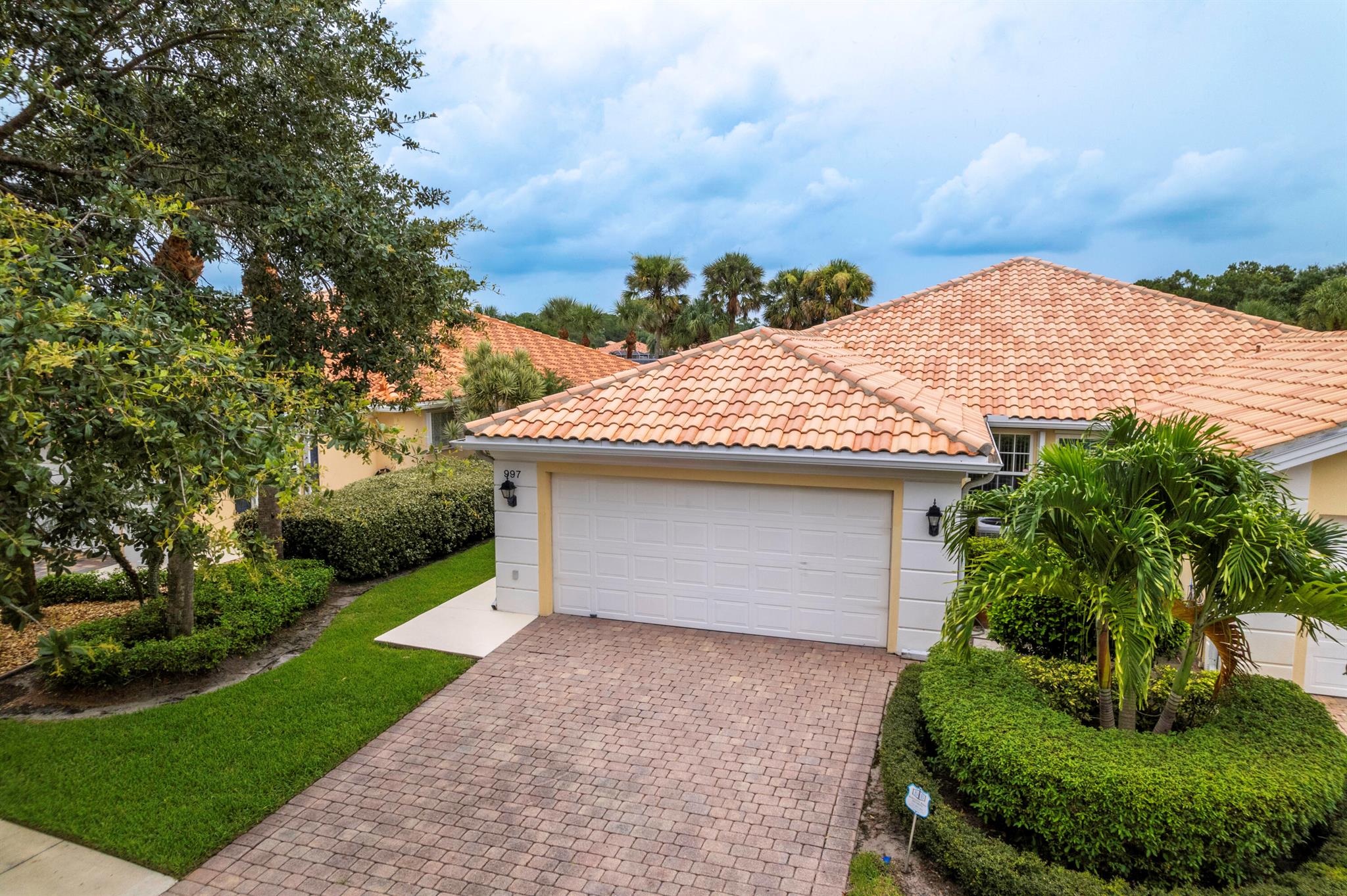 BRAND NEW ROOF!!! New roof scheduled to be installed in August with a 25-year new owner transferrable warranty.Expanded DiVosta Capri with an expansive screened lanai overlooking a beautiful water view and the 16th green! This is a golf community dream view! The Florida Club is a gated golf community with public pay and play golf. Florida Club Golf clubhouse offers a full bar and restaurant. A beautiful golf community with no membership equity required! Florida Club offers a community pool and tennis courts. Amenities of the HOA include lawn and landscape maintenance, basic cable, and internet. No lease allowed the first year of ownership. The Florida Club is just minutes away from Interstate 95 and a quick commute to downtown Stuart and a short drive to downtown West Palm Beach.