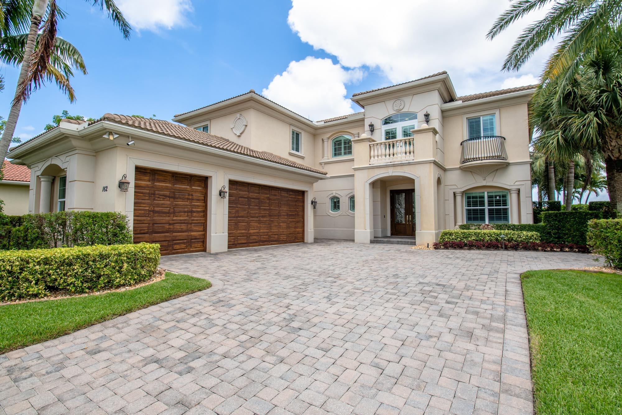 Luxuriously appointed and located in the private gated golf course community of Jupiter Country Club, this coveted Carina model is a wonderful floor plan that offers 5 bedrooms, 5 1/2 baths (including HIS & HER primary baths + closets) plus an office, loft and a 3 1/2 car garage. **BONUS: FULL GOLF MEMBERSHIP is available to the buyer of this home.** Full Golf & Associate Memberships are increasing to $100k & $50k effective August 1, 2024. Take advantage of the savings opportunity and close by August 1, 2024. There is currently a long waitlist for this sought-after level of membership. (Buyer could downgrade to social/club membership.) Experience outdoor living at its finest! Entertain guests by the saltwater pool and the gorgeous, custom summer kitchen with a wraparound bar. At the touch a button, operate the patio's motorized retractable screen and awning. Soak in the raised spa while relishing the stunning sunsets and entrancing fire bowl feature. The kitchen and family room area is the heart of the home. Gather for casual meals at the cozy breakfast nook and prepare meals surrounded by the beautiful quartz countertops, additional prep sink, upgraded cabinetry, dual wall ovens and custom vent hood. The divine primary suite is downstairs, boasting 2 separate spa-like bathrooms and walk-in closets, and a large sitting or desk area. Also downstairs is a guest suite with an en-suite bath and private patio. The curved staircase takes you to a spacious loft/flex space and access to the 3 guest bedrooms. One bedroom has an ensuite bath, the other two share a Jack n Jill bath. Arhaus light fixtures add to the elegant and welcoming ambiance of this home. Live comfortably in this energy efficient home with 3 AC units replaced in 2023, natural gas, tankless water heater, CBS construction, impact glass windows &amp; solid core doors. This home was also customized with 2 large storage rooms for storage optimization. The garage accommodates 3 cars PLUS a golf cart and has built-in storage galore. Jupiter Country Club is a luxury gated community conveniently located within close proximity of I-95 and the FL Turnpike, beaches, shopping, restaurants, parks &amp; nature preserves. Club amenities offer a plethora of social opportunities and include a Greg Norman Signature golf course, 2 resort-style pools, the newly remodeled Sway restaurant, a state-of-the-art fitness center + yoga/mat pilates/barre classes, tennis, bocce ball, pickle ball &amp; basketball. Members enjoy reciprocal privileges to Invited Clubs worldwide. Live your best life here!