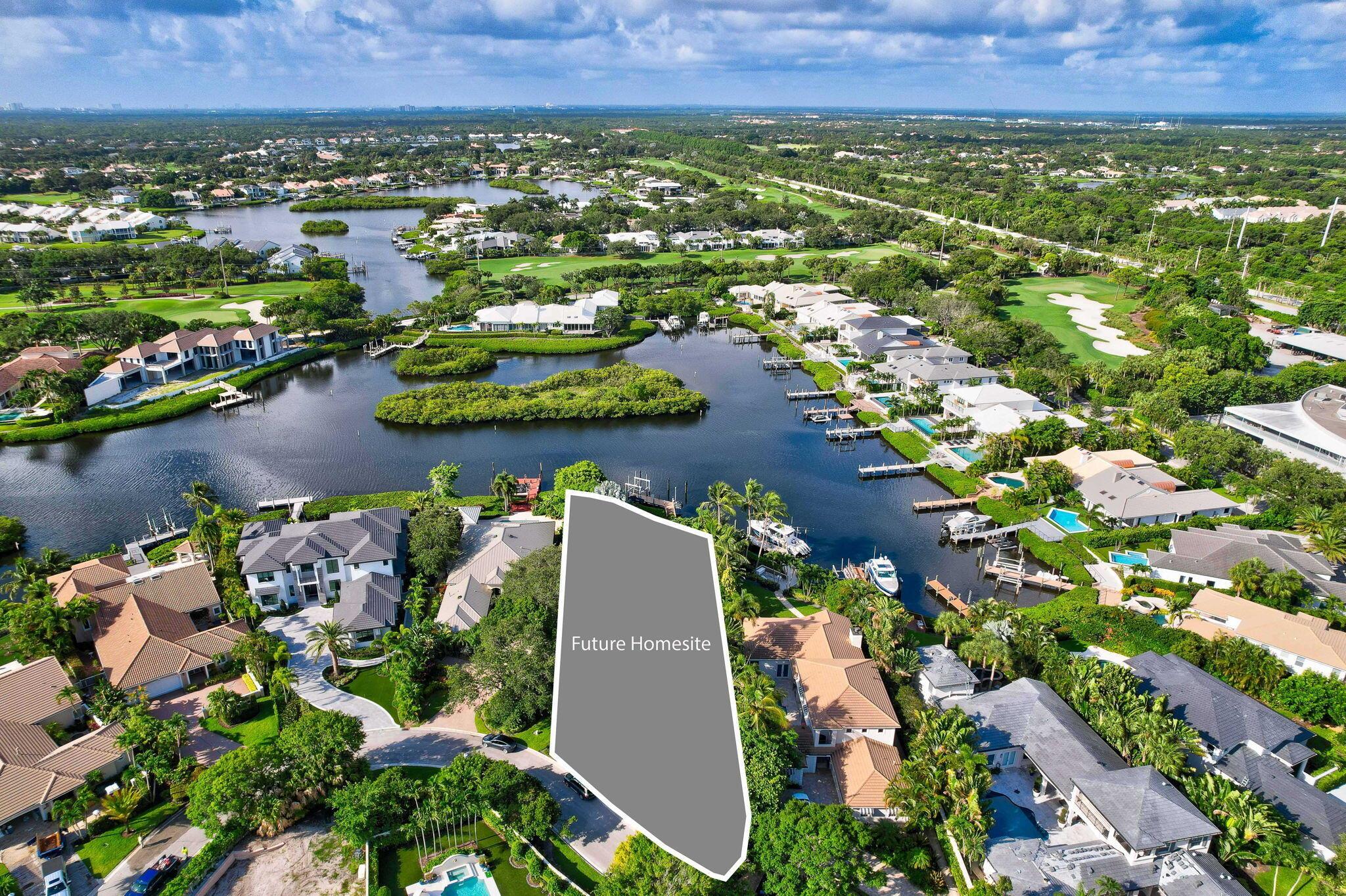 Experience luxury living on an expansive 100+ waterfront lot in the exclusive Admirals Cove.  Enjoy privacy, serene water views and ideal southern exposure.  Build your custom home in a community with top-tier amenities.  Existing home on site.