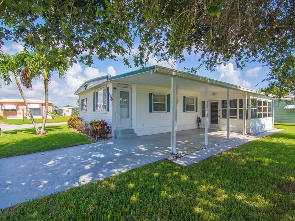 Beautiful 2/2 manufactured home on a corner lot.  This home features so much storage including a tool shed, pantry and Florida room.  It has been well maintained and is now looking for a new owner.  You'll love the active lifestyle at the 55+ community of Pinelake Village.  Friendly people and lots of activities.  Come check it out!