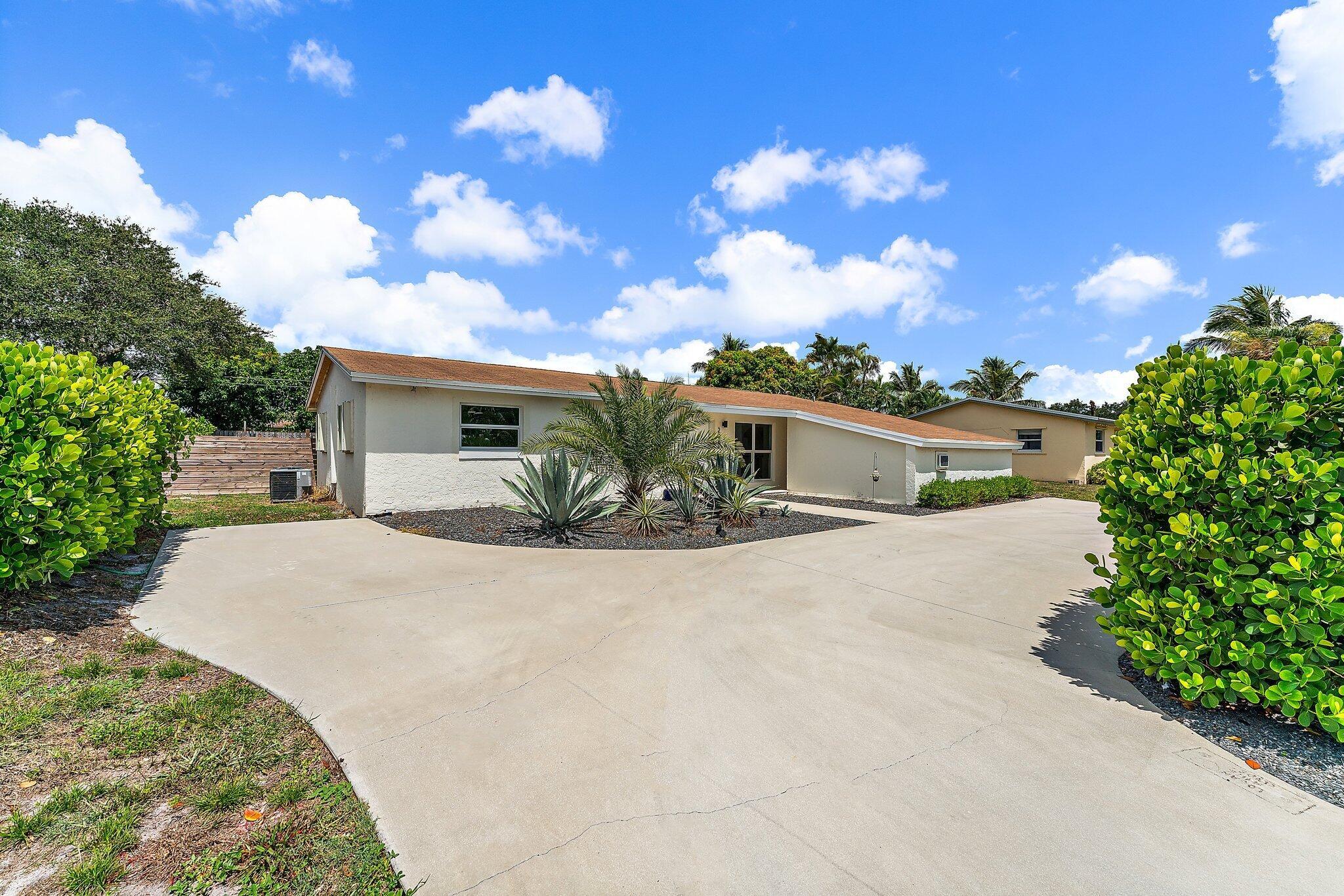 AVAILABLE NOW!  Move right into this fully renovated 3 bed, 2 bath home in the heart of Jupiter with a large fenced backyard and circular driveway.   You'll love the open layout, chef's kitchen with gas cookop and s/s appliances, walk-in pantry, walk-in closet and interior laundry room.  Home also has hurricane impact windows and large air conditioned converted garage.   Pets allowed on case by case basis.   No HOA.