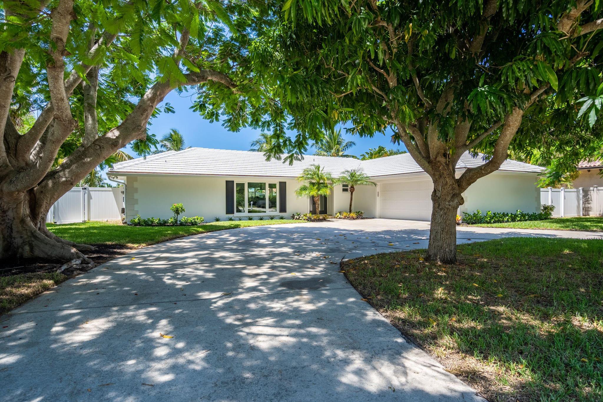 Fabulous and rare opportunity to own completely renovated home on deep water in the heart of Vero Beach! Beautifully situated lot adorned with vintage poincianas on 105 ft of water frontage. Natural light abounds in this reimagined home completed in 2023. Open concept floor plan with large island and built in bar for entertaining, pass through window to expansive covered lanai with beautiful travertine deck. New roof, plumbing, electric, windows, and pool. 3 Bedrooms, 3.5 Bath with 4th flex room as office or bedroom. Easy access to barrier island, beaches, restaurants and shopping. Flood Zone X