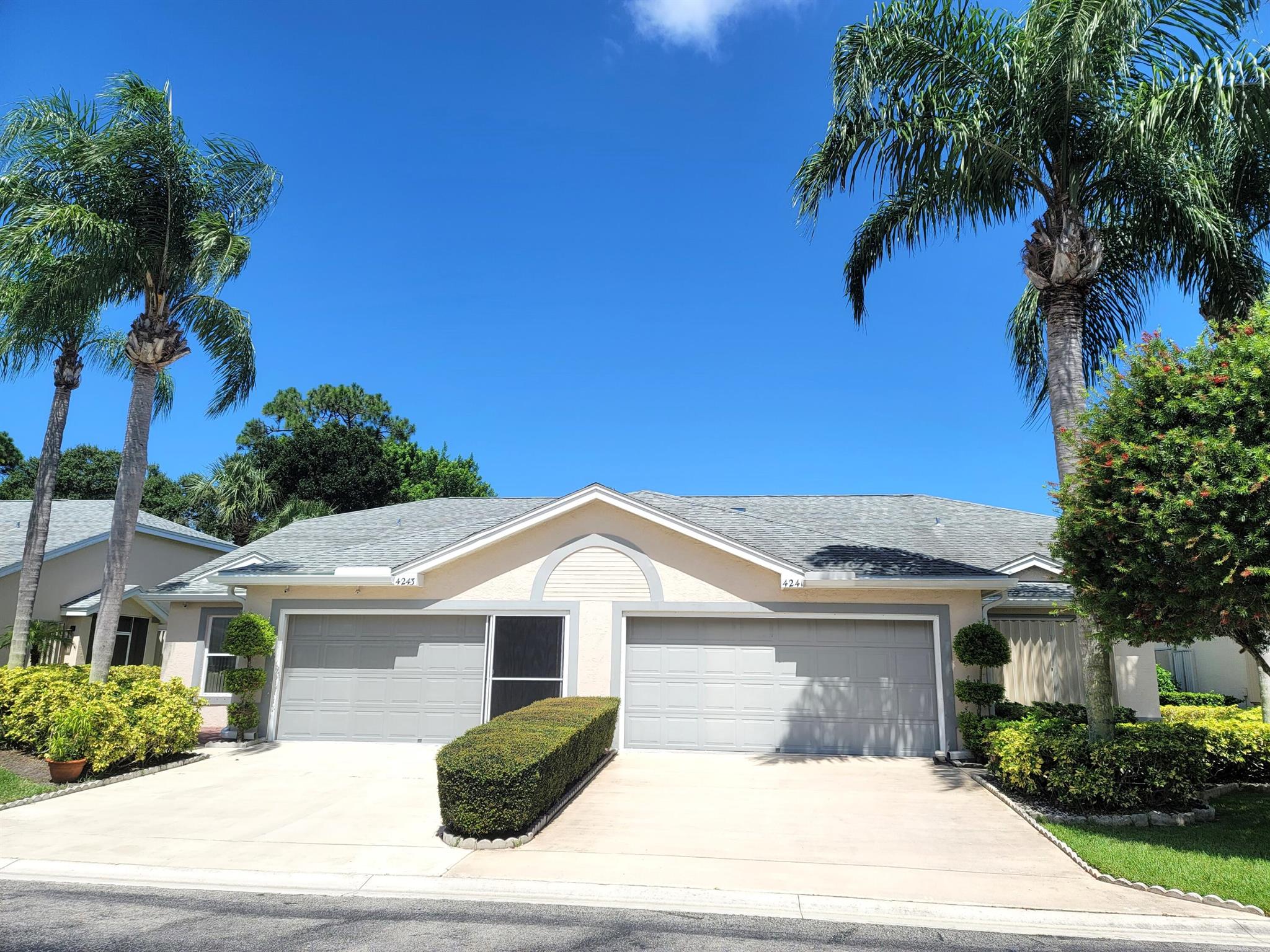 BEAUTIFUL, 2 BEDROOM, 2 BATHROOM, CBS 2 CAR GARAGE  VILLA, LOCATED IN VERY SPECIAL COMMUNITY, CLOSE TO SHOPPING, PARKS, WILDLIFE CENTER W/HIKING TRAILS, CIVIC CENTER, AND LESS THAN 9 MILES TO HUTCHINSON ISLAND BEACHES & DOWNTOWN STUART. HOME HAS AN ENCLOSED ENTRY, LIVING RM & KITCHEN WITH VAULTED CEILINGS. LIGHTED PLANT SHELVES & SKYLIGHT, TILE FLOORING THROUGHOUT. LARGE FLORIDA ROOM HAS UPDATED WINDOWS AND TALL HEDGE FOR PRIVACY. LARGE MASTER BEDROOM HAS VOLUME CEILING & HUGE WALK-IN CLOSET. NEW AC 2022, ROOF 2014. OVERSIZED 2 CAR GARAGE HAS PULL-DOWN STAIRS FOR ATTIC STORAGE. ST LUCIE GARDENS IS A SMALL PRIVATE COMMUNITY  OF ONLY 112 VILLAS WITH A CLUBHOUSE & POOL OVERLOOKING A LAKE.  COMMUNITY HAS UNDERGROUND WIRING AND IS IN THE SAME GRID AS HOSPITAL SO ALMOST NEVER LOOSES POWER.