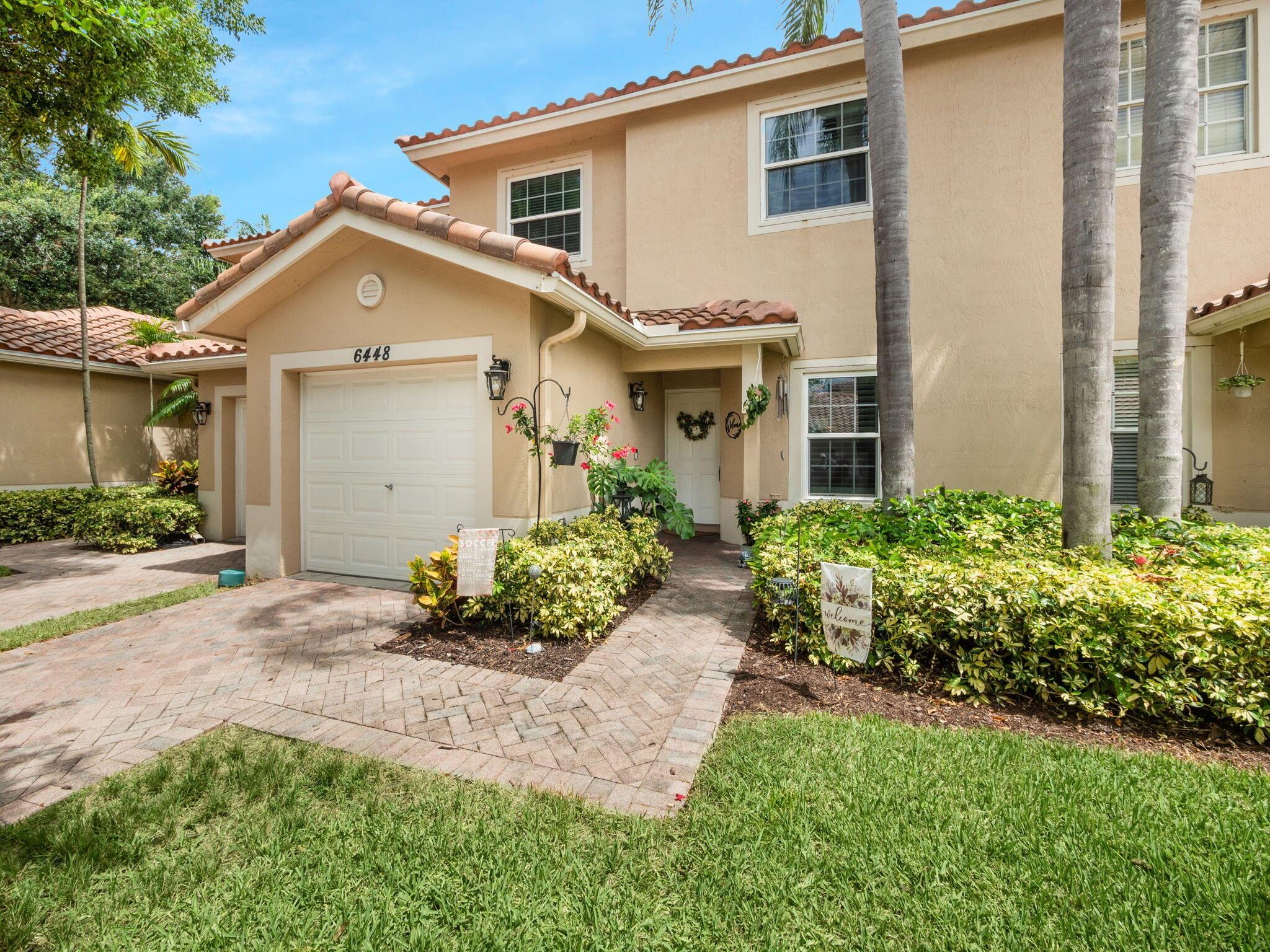 This Beautiful 3 bedroom 2.5 bath townhome is nestled in the highly sought after, quiet little Boynton Oasis community, right off of Jog Rd., between BB and Woolbright conveniently located to everything. This home offers a main level primary bedroom suite with 2 closets, vaulted ceilings and Plantation Shutters throughout. Kitchen offers Newer Appliances, Granite countertops and a separate dining room. The home has been freshly painted, showing off the soaring vaulted ceilings in the Great Room, that leads you out onto your very private, beautiful custom tiled patio. Upstairs you will find 2 generous sized bedrooms & another full bathroom. There is a 1 car garage housing the washer & dryer, with ample storage cabinets and room for your vehicle.  For Investors it can be rented right away!!