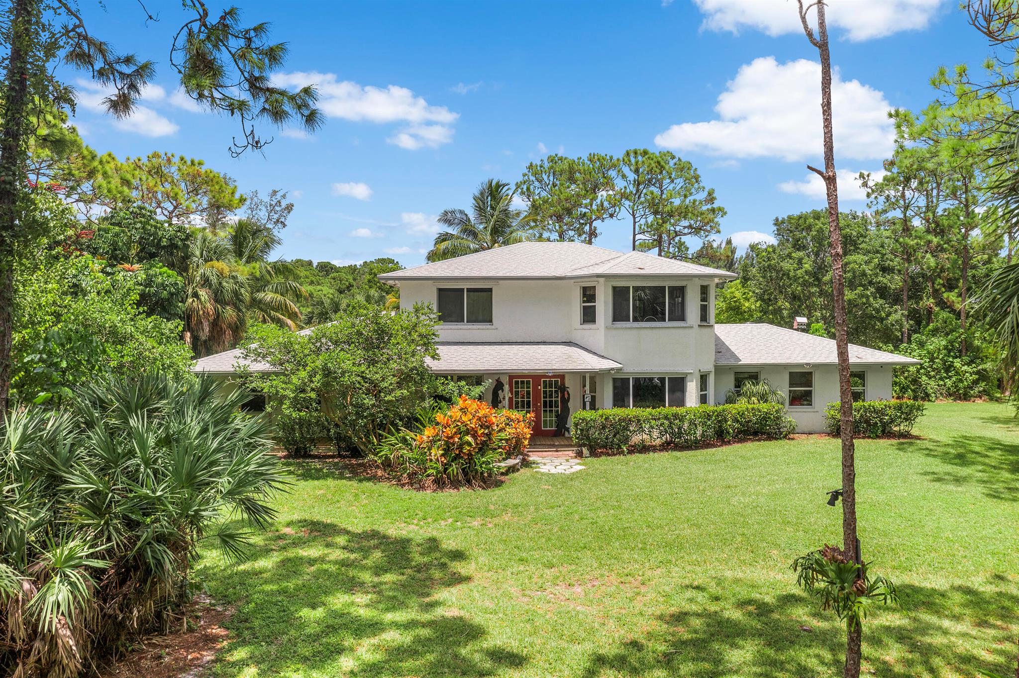 Come check out this Custom-built two-story home on an oversized corner lot.The downstairs features a gas fireplace open to a large living area, a roomy kitchen, and one bedroom and bath on the first floor.The second floor has two additional bedrooms, one of which is on WIC. On the opposite side, upstairs houses the Master suite, which has a separate walk-in closet and master bath with a soaking tub and shower.The yard is a place to relax and enjoy all Mother Nature has to offer. The back deck   is covered and has a view of the fully stocked pond. There is a full sprinkler system that gets water directly from the pond. The lot is fully fenced with trees and shrubbery for plenty of privacy. There is even a 30-amp RV hookup with water on the west side of the house. So, bring the family and all the toys and make it yours.
The roof was replaced in 2021, water heater in 2019  &amp; 2 zone A/C with a newer compressor