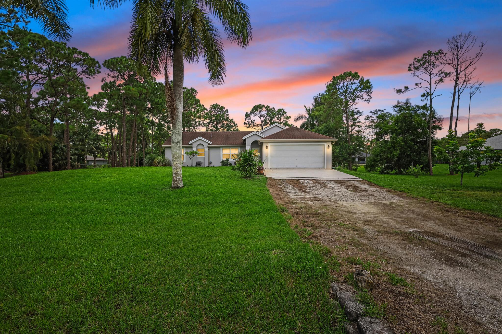 Welcome to this beautifully updated 4-bedroom, 2-bathroom GREEN home, offering the perfect blend of modern living and serene country charm including a paid off solar array SAVING 1000'S OF DOLLARS A YEAR. in electric bills.  Situated on a spacious 1.25-acre lot with no HOA restrictions, this property provides ample space for your dream lifestyle, including the potential for a detached guest house, garage, or even a barn for your horses and livestock.As you step inside, you'll be greeted by an inviting open-concept layout that seamlessly connects the living room, dining area, and kitchen. Vaulted ceilings with elegant crown molding add a touch of sophistication The heart of the home is the recently updated kitchen, featuring sleek quartz countertops, stainless steel appliances, and plenty of cabinetry for all your storage needs. Whether you're hosting a dinner party or enjoying a quiet meal at home, this space is perfect for both entertaining and everyday living.

The split bedroom plan offers privacy and comfort, with the master suite serving as a true retreat. It boasts a spacious walk-in closet, a luxurious en-suite bathroom with double sinks, and a walk-in shower. The remaining three bedrooms are generously sized and share a well-appointed bathroom.

Step outside to your own private oasis, where a stocked pond, fire pit, and shaded outdoor dining area create the ultimate setting for relaxation and entertainment. The expansive backyard is ideal for a variety of outdoor activities, with plenty of room to park your boat, RV, or trailer. The property is also equipped with a solar array, making it both eco-friendly and energy-efficient.