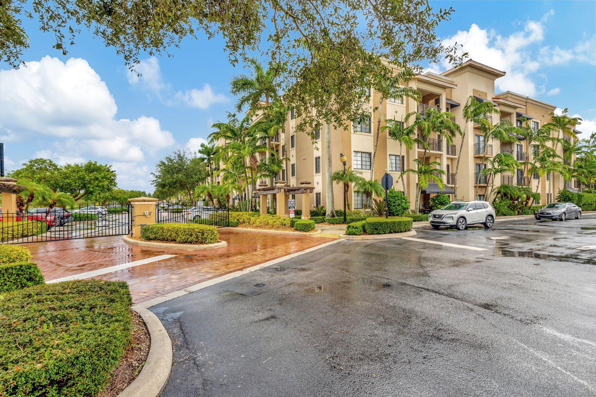 Incredible location at Midtown in desirable Palm Beach Gardens. Beautiful, spacious and luxurious condo with unique and charm-filled layout. 1880 sf. Owner suite and guest suite each with luxury baths. All BRs have walk-in closets! Kitchen has granite countertops and stainless appliances. Two large covered balconies (and storage). No carpeting. Reserved garage and assigned exterior parking spaces. Luxury gated condo community has contemporary clubhouse with fitness room, business center and onsite manager; large heated pool w/tub and tennis/pickleball. Lakeside walking path. Extraordinary convenience: easy access to I95 and Turnpike. Adjacent to numerous top restaurants, shops, two supermarkets (Publix, Fresh Market) and health/public services. Close to Gardens Mall and Downtown Gardens.