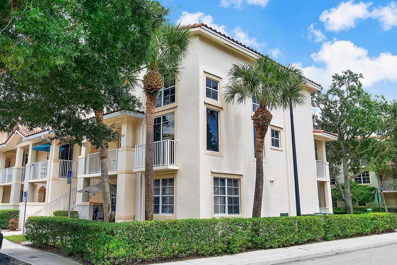 Make this spacious 3-bed, 3-bath, end unit condo yours and find yourself in the heart of Jupiter. This community is pet friendly, allowing 2 pets without a restriction on weight.  With an open kitchen, volume ceilings, and two covered balconies, it's ideal for relaxing or entertaining. Just steps away from retail shopping, diverse dining, the amphitheater, baseball stadium, you'll never run out of things to do. If you are looking for an active and walkable area to live, this is it. The community also has extensive walking trails, basketball and tennis courts, a skate park, and a public golf course.