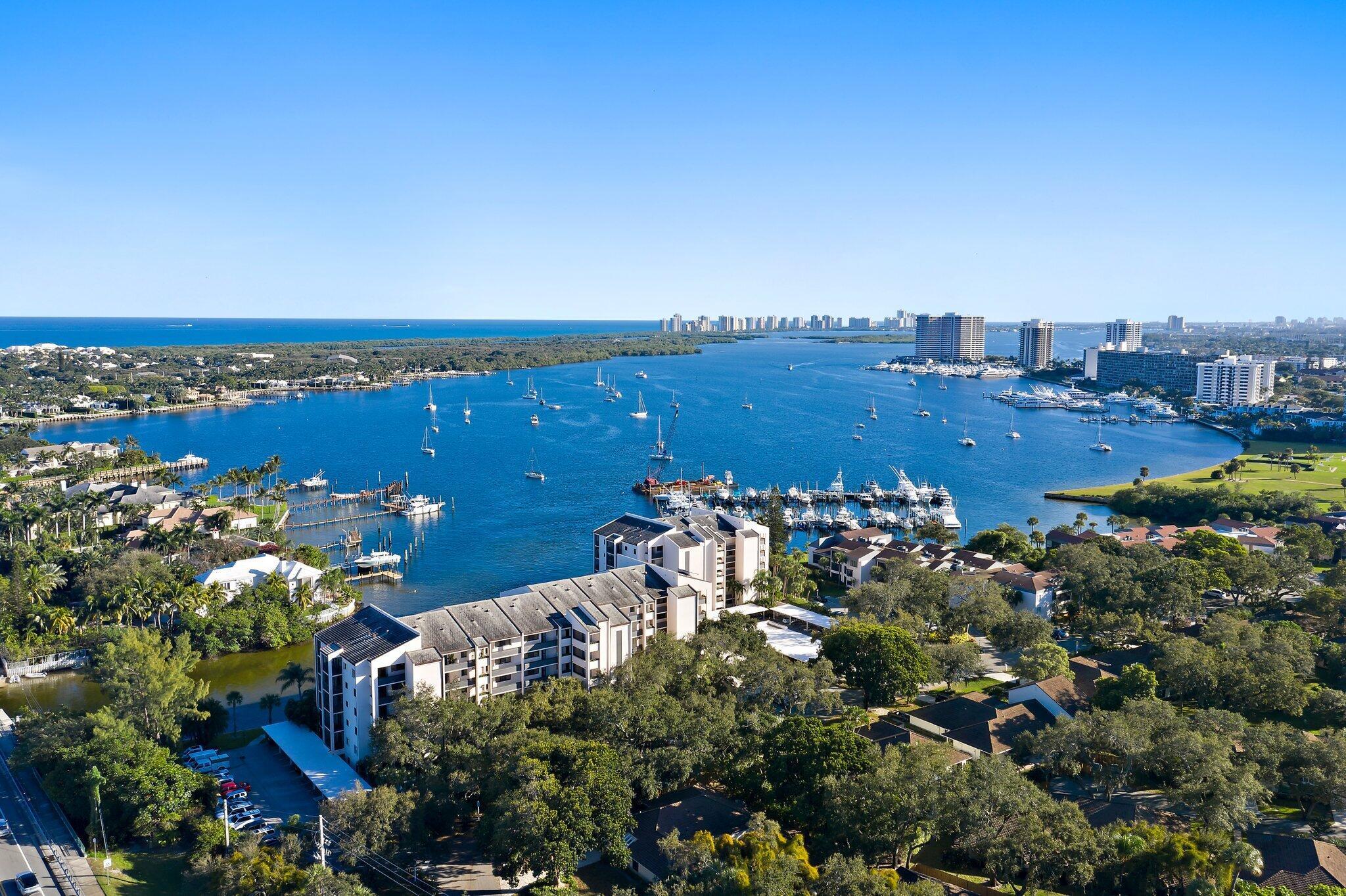 Experience the best of coastal living in this beautifully updated 2-bedroom, 2-bathroom waterfront end unit condo in North Palm Beach. Enjoy sweeping views of the Intracoastal Waterway and the sparkling community pool. Being an end unit, this condo is flooded with natural light from its two balconies and many windows, creating an airy, open atmosphere throughout.nside, you'll find elegant engineered wood plank floors, a modern white kitchen with granite countertops, and updated bathrooms, all designed for comfort and style. The spacious, light-filled living areas make this a truly inviting home. Located in a 24-hour manned gated community, you'll have peace of mind with security and privacy. With concrete restoration nearly complete and the assessment already paid by the seller, you can