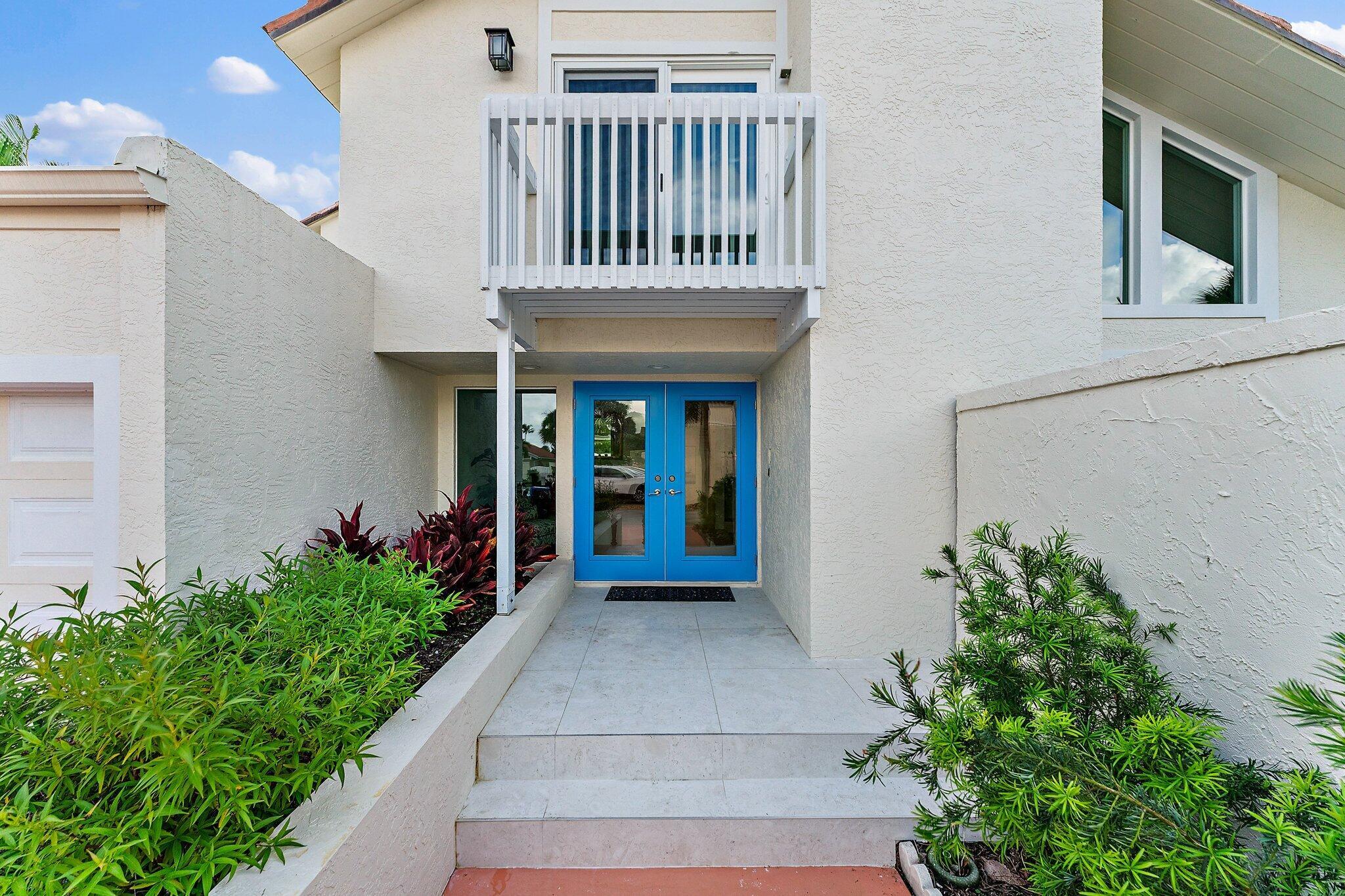 One of the best locations within steps of the pristine blue waters of the Atlantic Ocean.  Live within the enclave of Ocean Walk, a community surrounded by coastal living at its finest.  Minutes from renowned restaurants, I-95 and the turnpike and 20 minutes to Palm Beach International airport. The interior of this home has been completely renovated with gorgeous porcelain flooring, newly well appointed kitchen, all new bathrooms thru-out and all new hurricane impact windows.3 bedroom, 3 bath, 2 car garage with a large heated pool and spa.  The back has an eastern exposure which provide this home with natural beautiful light all day long.  There is a large covered lanai that will give you outdoor living at it finest.  Call for a tour to come and see for yourself.