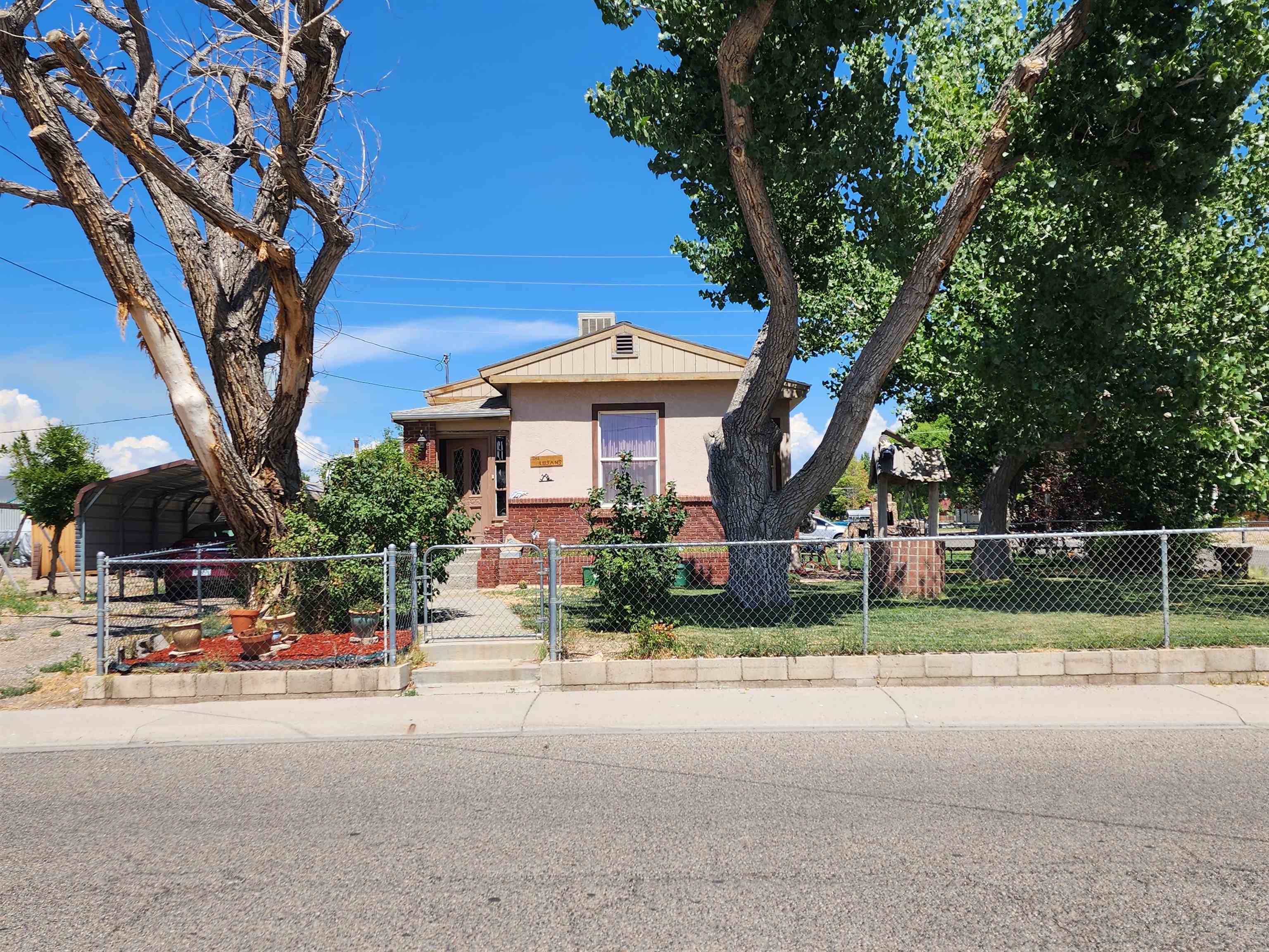 Classic 1925 Bungalow.  This property is currently located in the Commercial Zoning C1 (Neighborhood friendly businesses).  Proposed Future Land use map for Fruita includes it in the Downtown Mixed Use area. Property is 0.55 Acres and has endless possibilities for development...multifamily housing, housing with business on the main floor warehouse in the back and living quarters up above, it's an open palette of possibility. Price $500,000 and is contingent on the owner finding an acceptable replacement property. All offers are contingent on the seller finding an acceptable replacement property.   Must have 24 hours notice for all showings.