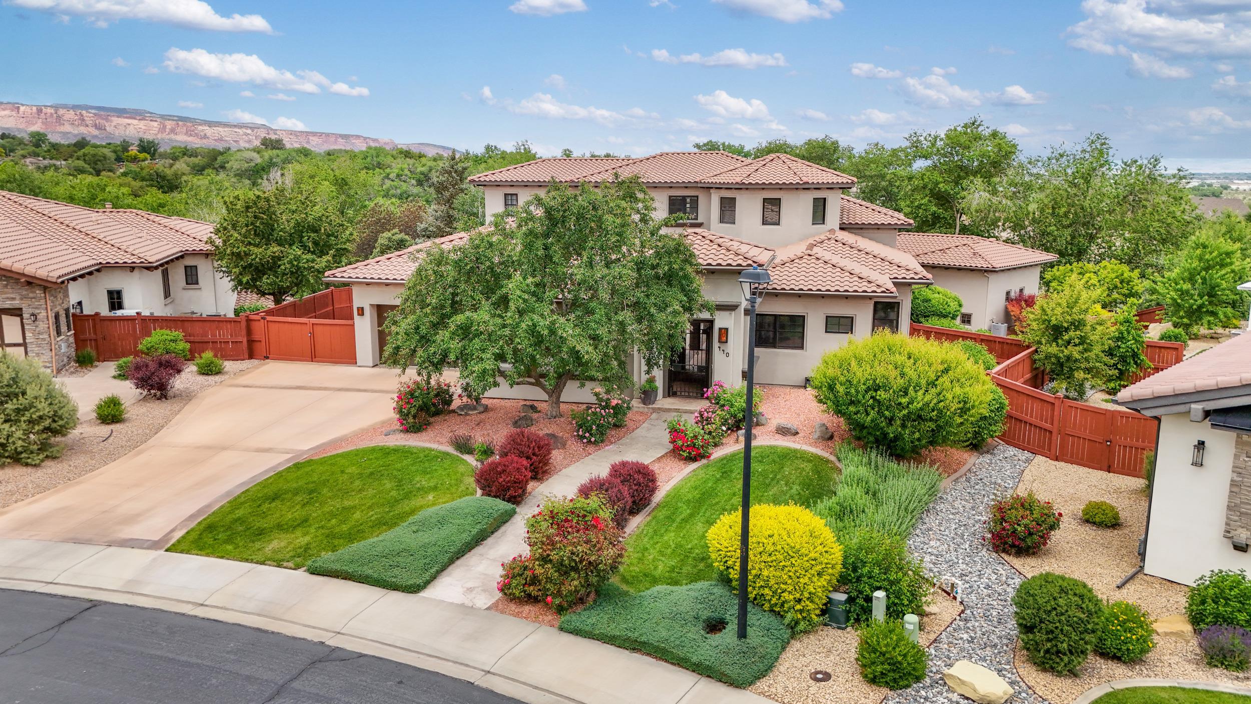 Welcome to 440 High Pointe Circle! As you step inside this Mediterranean-style masterpiece, you'll be greeted by a private courtyard that sets the tone for luxury living.  This stunning residence offers an expansive living area of 5464 square feet, providing ample space for relaxation and entertainment. With 5 bedrooms and 5 bathrooms, there's plenty of room for everyone to enjoy.   The main level features a primary suite with a 5-piece bathroom, and a spacious walk-in closet that connects to a hidden room.  The kitchen has a large center island, premium appliances and has that open concept feel .  Upstairs you will find a family room, three addiontial guest suites and plenty of room to stretch out.   The property boasts a beautiful in-ground salt water pool, perfect for cooling off on hot summer days. Additionally, there's a versatile casita that can be used for multiple purposes, such as gym, home office, or entertainment space. It has a 3/4 bathroom.   Enjoy breathtaking views from various vantage points within the property, adding to the overall allure of this magnificent home.  Conveniently located near golf courses, shopping centers, and a variety of dining options, this home offers easy access to all your everyday needs. For outdoor enthusiasts, there are plenty of opportunities for recreation, including nearby river walks and outdoor activities. Seller is now offering a $5,000 flooring allowance OR interest rate buy down!