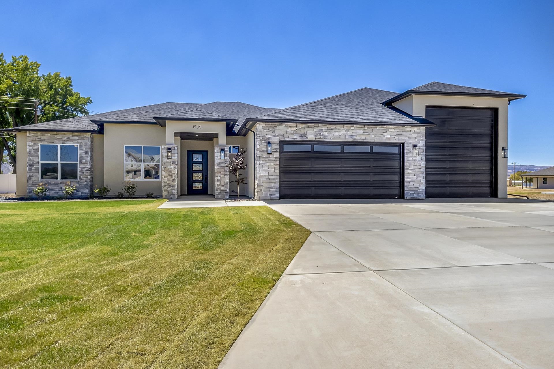 A rare find! NEW CONSTRUCTION on 1 acre in a quiet cul-de-sac only TWO miles from downtown Fruita. This home features impeccable mountain views, premium finishes, a 3 car/RV garage with epoxied floors, gas fireplace, all major appliances, front landscaping & full fencing. Ten-foot ceilings throughout with an open ranch-styled floor plan creates a bright atmosphere. Embrace serene outdoor living with a large patio and huge glass doors that are perfectly aligned with the Colorado National Monument. Live in open space yet still be close to all Fruita and Grand Junction amenities. Schedule your private showing today!! All information including but not limited to sq. ft., measurements, pricing & availability are all subject to change/error without notice.