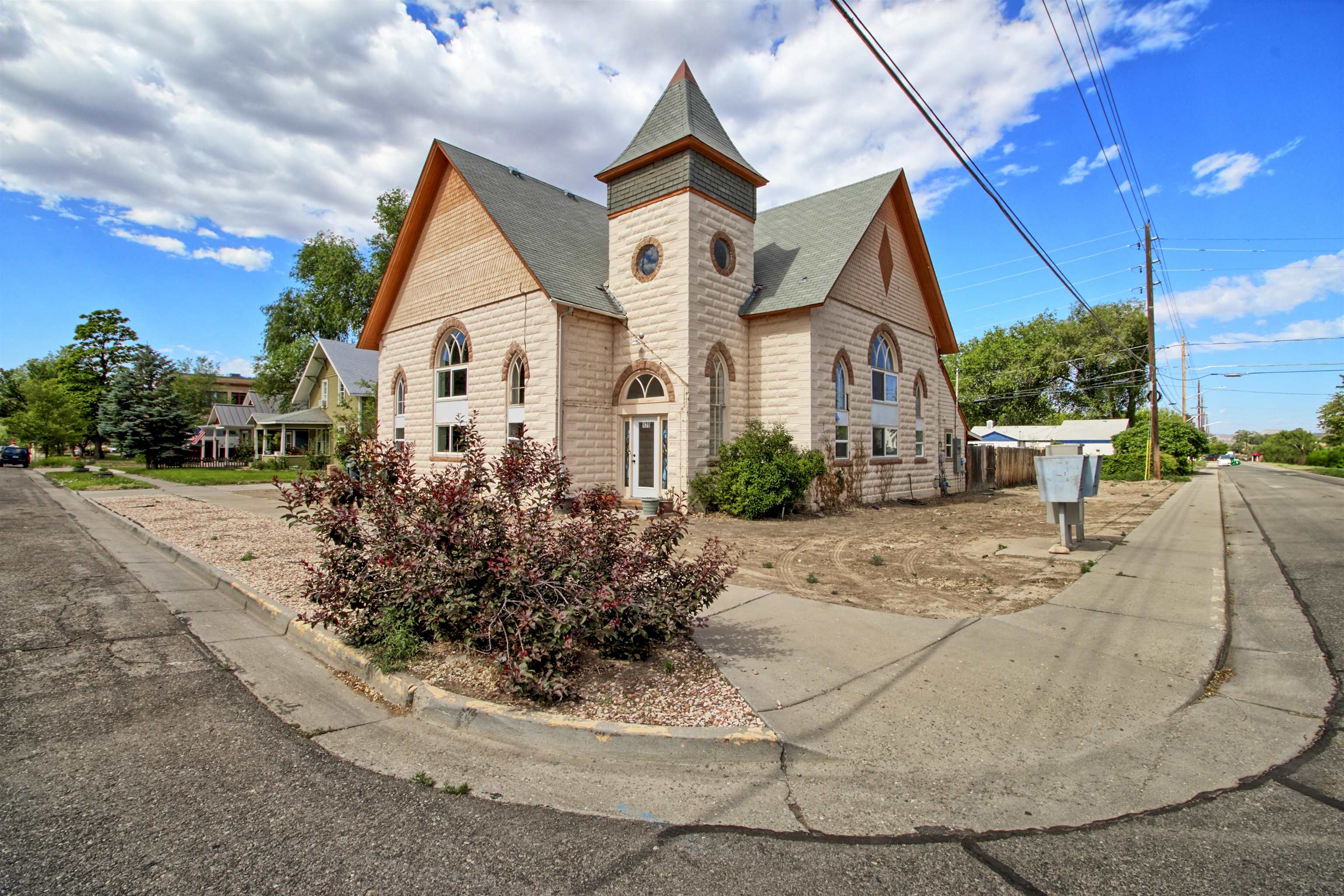 If these walls could talk…. they have housed many families over the years, lots of gatherings and served as a church for a time. Part of Fruita’s history that has stood the test of time. Interior of the home was gutted in 2018 and then reimagined into a wonderful space with quirks and character (Just like Fruita)! With 3 bedrooms, 4 baths, multiple flex spaces, living room, family room, formal dining, breakfast nook, crazy big kitchen with concrete countertops, amazing staircase, cathedral windows and heated workspace (could be additional living quarters). Did I mention the great location? Large yard with RV parking, or ample gardens. Check with the City of Fruita about building an ADU. So much has been done to this home and now it’s ready for you to add to the History! Home Warranty is included.