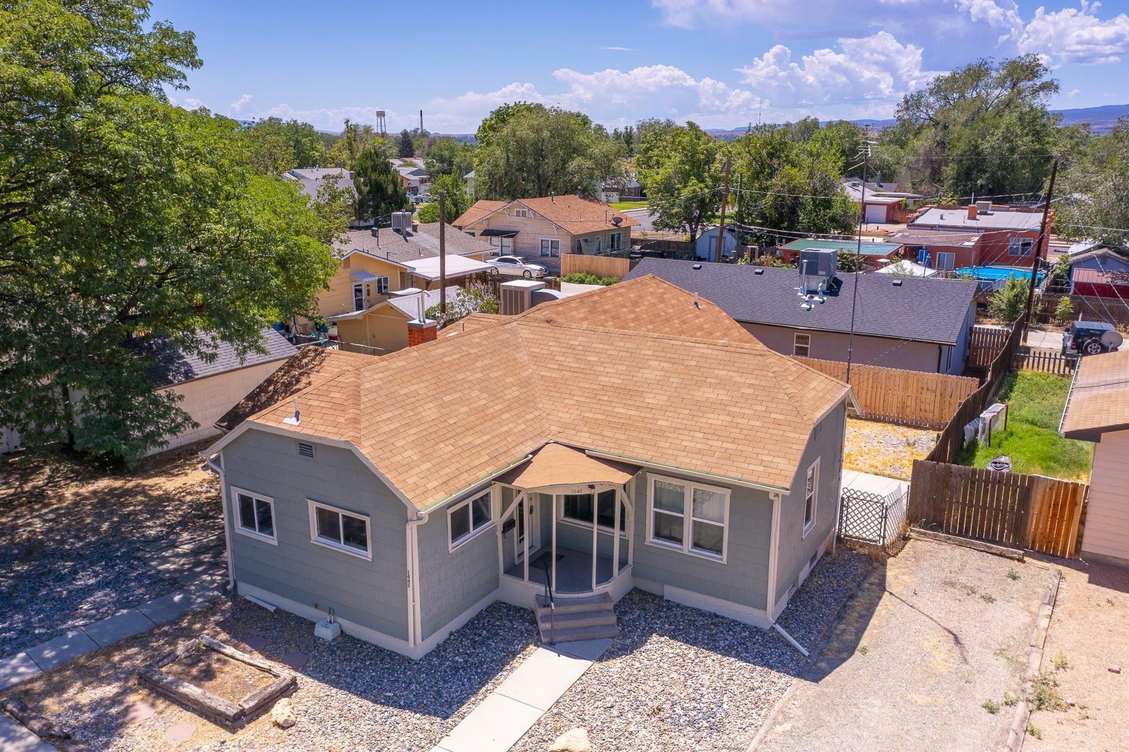 Welcome to this exceptional property offering not just one, but two homes on a single lot, perfectly situated within walking distance to Colorado Mesa University. Whether you're looking for a savvy investment or a multi-generational living solution, this is a rare find.  ¼ miles from CMU Main House (5 Bed / 2 Bath): • Spacious and well-maintained with five bedrooms and two full bathrooms. Second House (3 Bed / 1 Bath): • Cozy and inviting with three bedrooms and one full bathroom. • Perfect for additional rental income, extended family, or as a guest house. • Offers privacy and comfort with its own distinct charm. Property Highlights: • Located in a desirable neighborhood close to Colorado Mesa University, making it highly attractive to students and faculty. • Both homes boast a well-maintained exterior and landscaping, enhancing curb appeal. • Plenty of parking space available, ensuring convenience for residents and guests. Investment Potential: • Generate rental income from two separate units, maximizing your return on investment. • Take advantage of the high demand for housing near Colorado Mesa University. Don't miss out on this rare opportunity to own two homes on one lot in such a prime location. Schedule your private showing today and envision the possibilities this property offers!