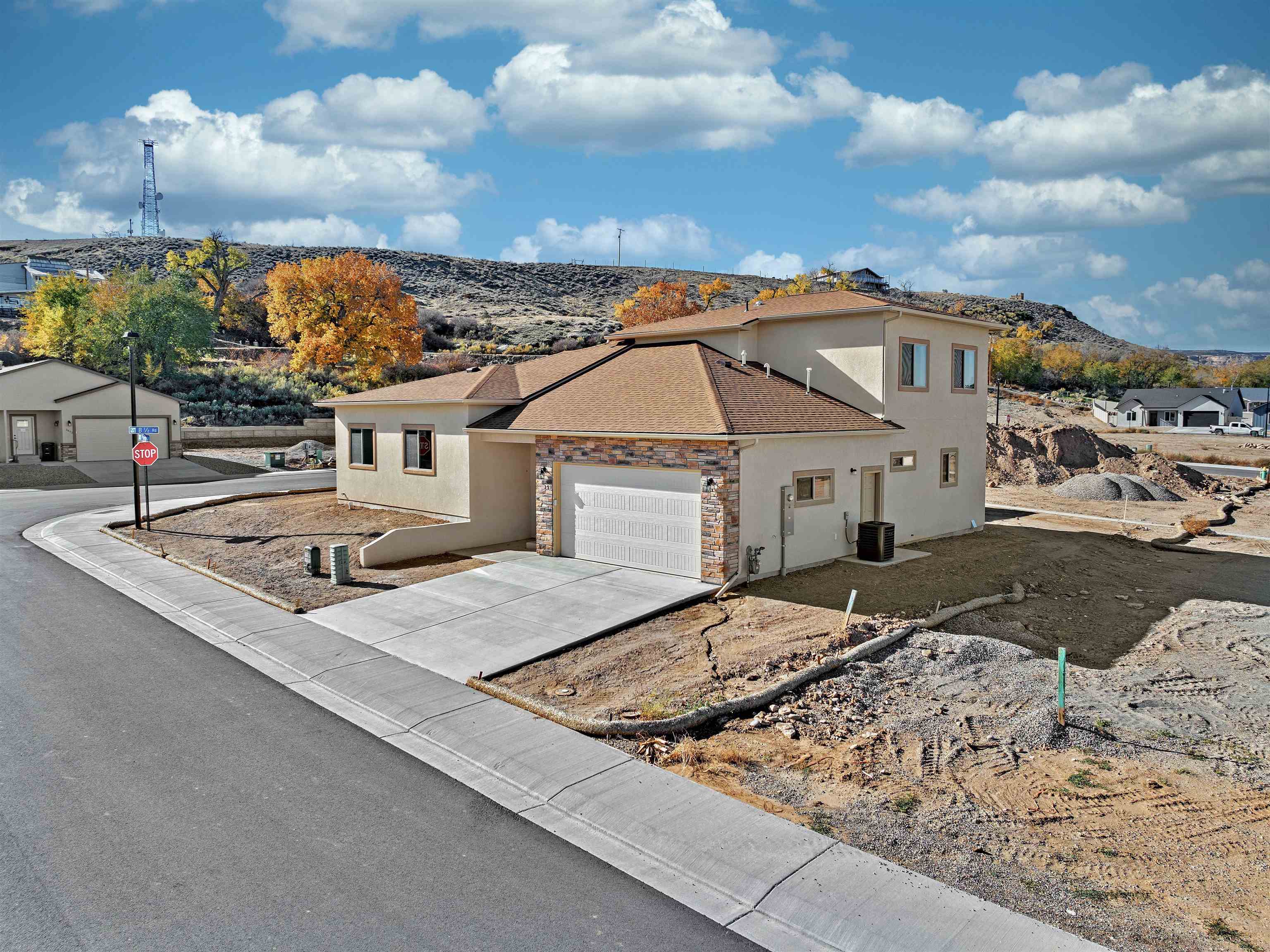 Welcome to your brand-new energy-efficient home by Senergy Builders, nestled in the hidden gem of Cimarron Mesa in Orchard Mesa. This 3-bedroom, 2.5-bathroom residence showcases the latest Energy Star techniques, ensuring comfort and sustainability. Step inside to discover an open and inviting floor plan designed for modern living. The kitchen features state-of-the-art appliances, sleek countertops, and ample cabinet space, perfect for culinary enthusiasts and entertainers. The main living area provides plenty of room for entertaining, and you will find all three bedrooms upstairs, along with two full baths. Enjoy the tranquility of the Cimarron Mesa neighborhood and enjoy the views. Easy to show; see it today!