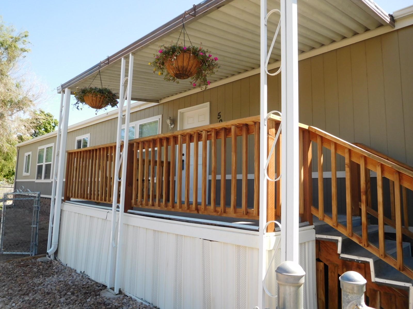 This cozy, lovely home 3 bed 2 bath 1044 sq. Ft.single manufacture home in the heart of Fruita, Co. Walk or bike into town close to hospital ,school’s, shopping, restaurants or coffee shops. New laminate flooring in main room. Extra cabinets and shelving in closets.  Nice Corner lot extra parking on the back and side of home. Come and see this lovely home. All information including but not limited to sq. ft, measurements, pricing and availability are all subject to change/error without notice. Buyer's to verify all information.