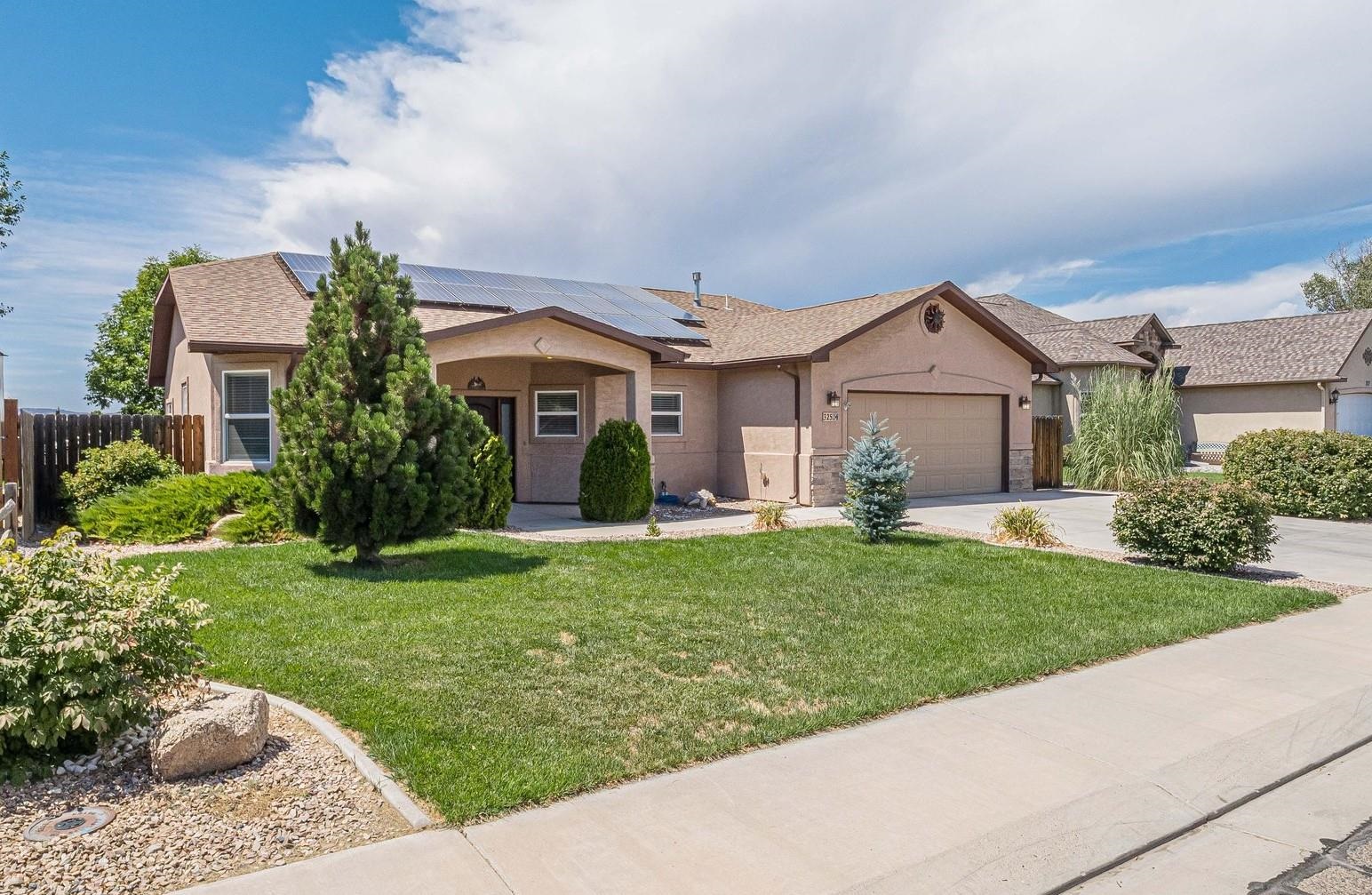 Welcome to this charming 3 bed, 2 bath home located in the beautiful town of Fruita, Colorado. This gem features a spacious open floor plan, perfect for entertaining guests or simply relaxing with loved ones. The separate formal dining room adds an elegant touch to this already stunning home. Or the new owner can use this separate space for an office! Enjoy the refrigerated central air indoors or relax on the covered patio in the comfort and privacy of your own fenced backyard. This home also boasts a two-car garage and owned solar panels for added energy efficiency. Located near parks and outdoor recreation areas, this home offers the perfect balance between city convenience and outdoor adventure. Don't miss out on this incredible opportunity to own a piece of paradise in Fruita! After a day of hiking or biking, you can come home to relax in your own piece of paradise, away from the hustle and bustle of the city. With easy access to both urban amenities and natural beauty, this home truly offers the best of both worlds. Make the most of every moment and create lasting memories in this idyllic setting in Fruita.